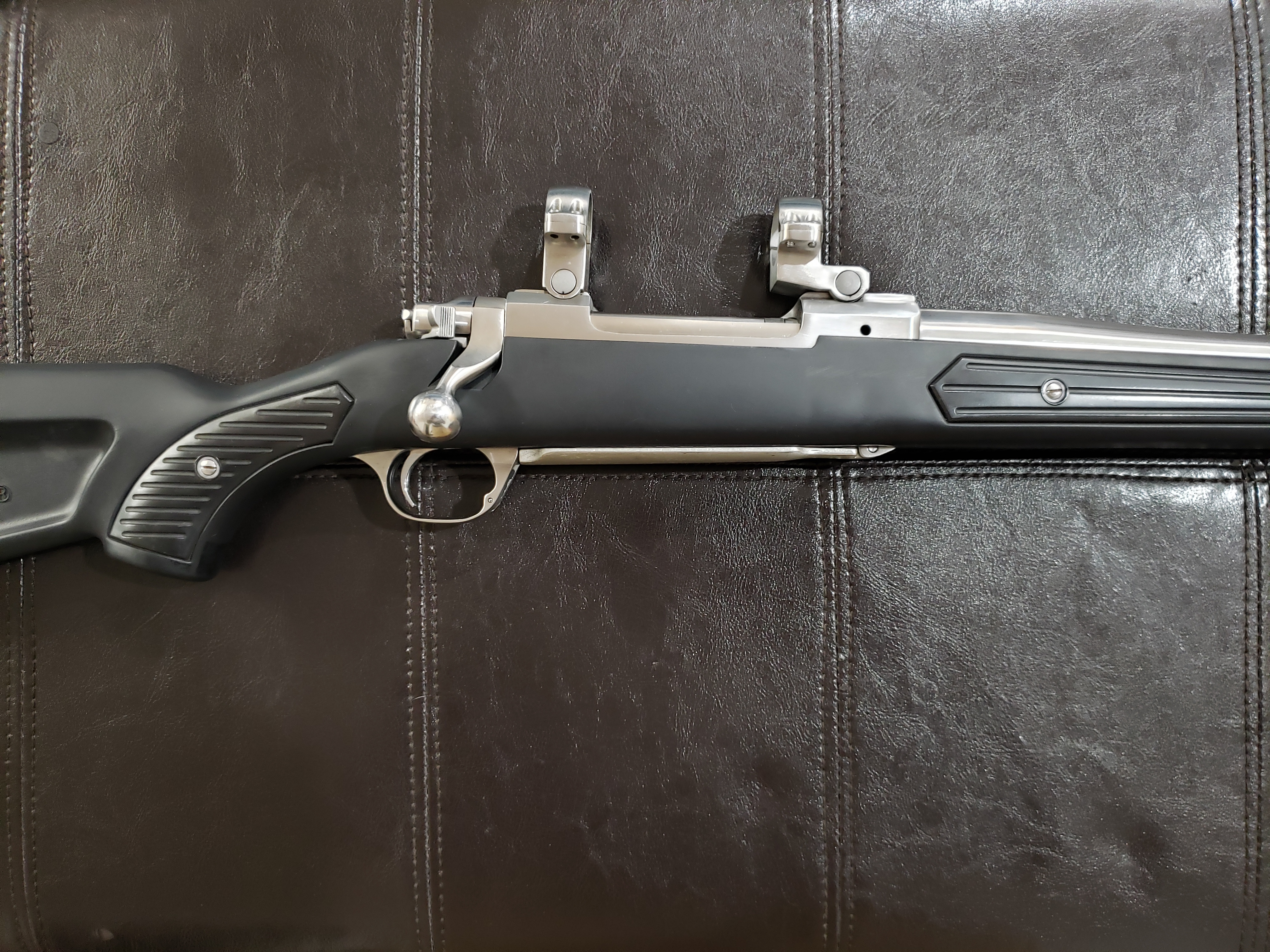 Photo of Ruger M77 Mark II 'Zytel' ("Boat Paddle Stock") Stainless/Synthetic 7mm Rem. Mag. Bolt-Action Rifle w/ Rings