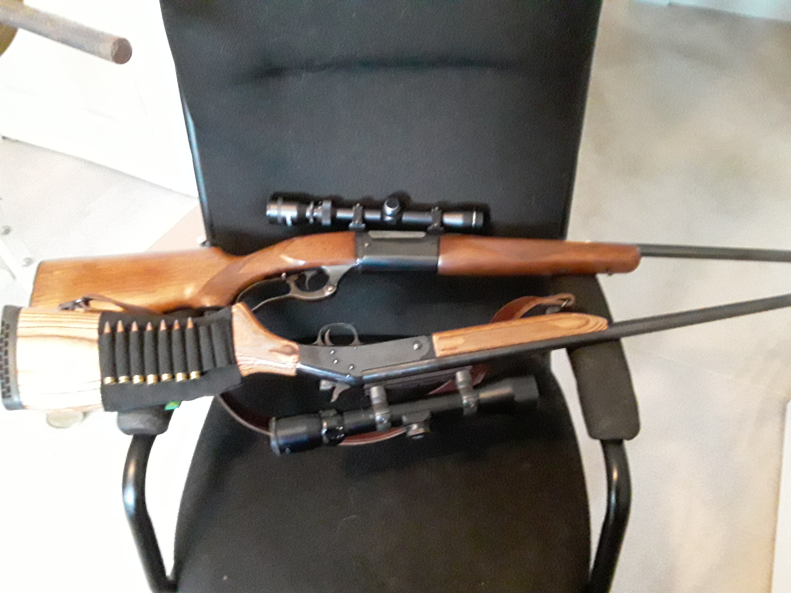 Photo of 250 Savage Model 99 and New England firearms. 308