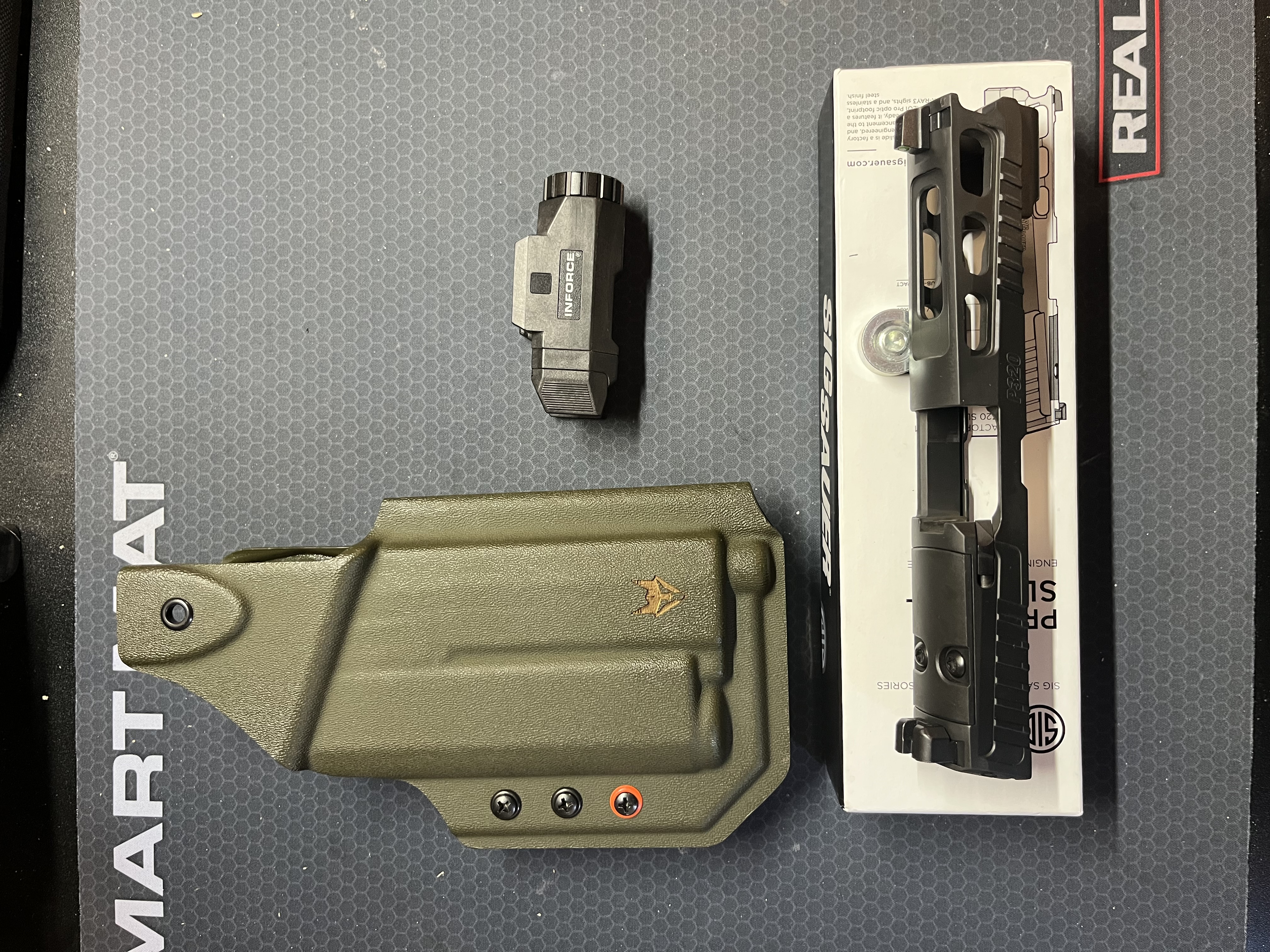 Photo of Sig sauer P320 pro cut slide gray fox strategic holster in force light 