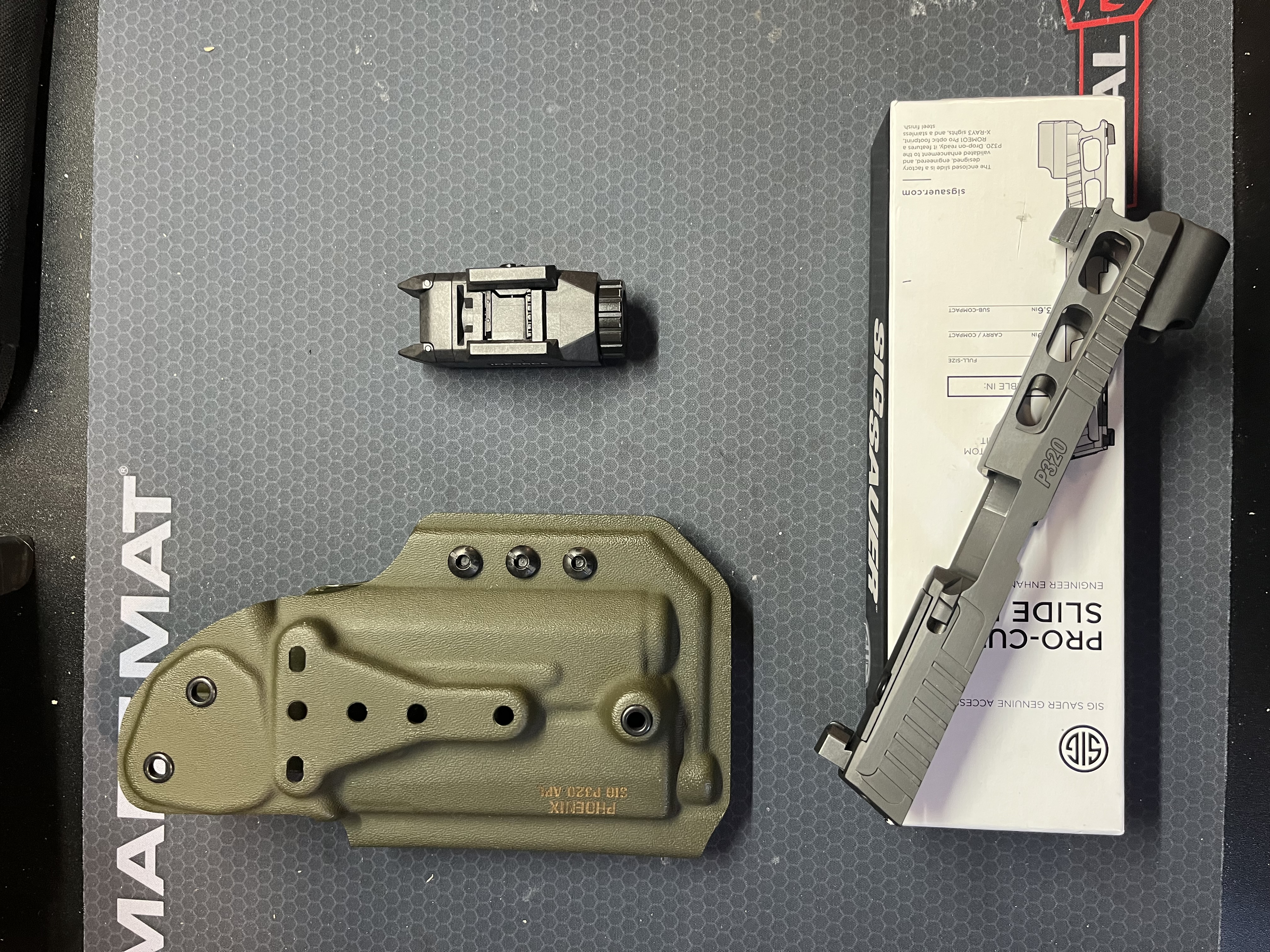 Photo of Sig sauer P320 pro cut slide gray fox strategic holster in force light 