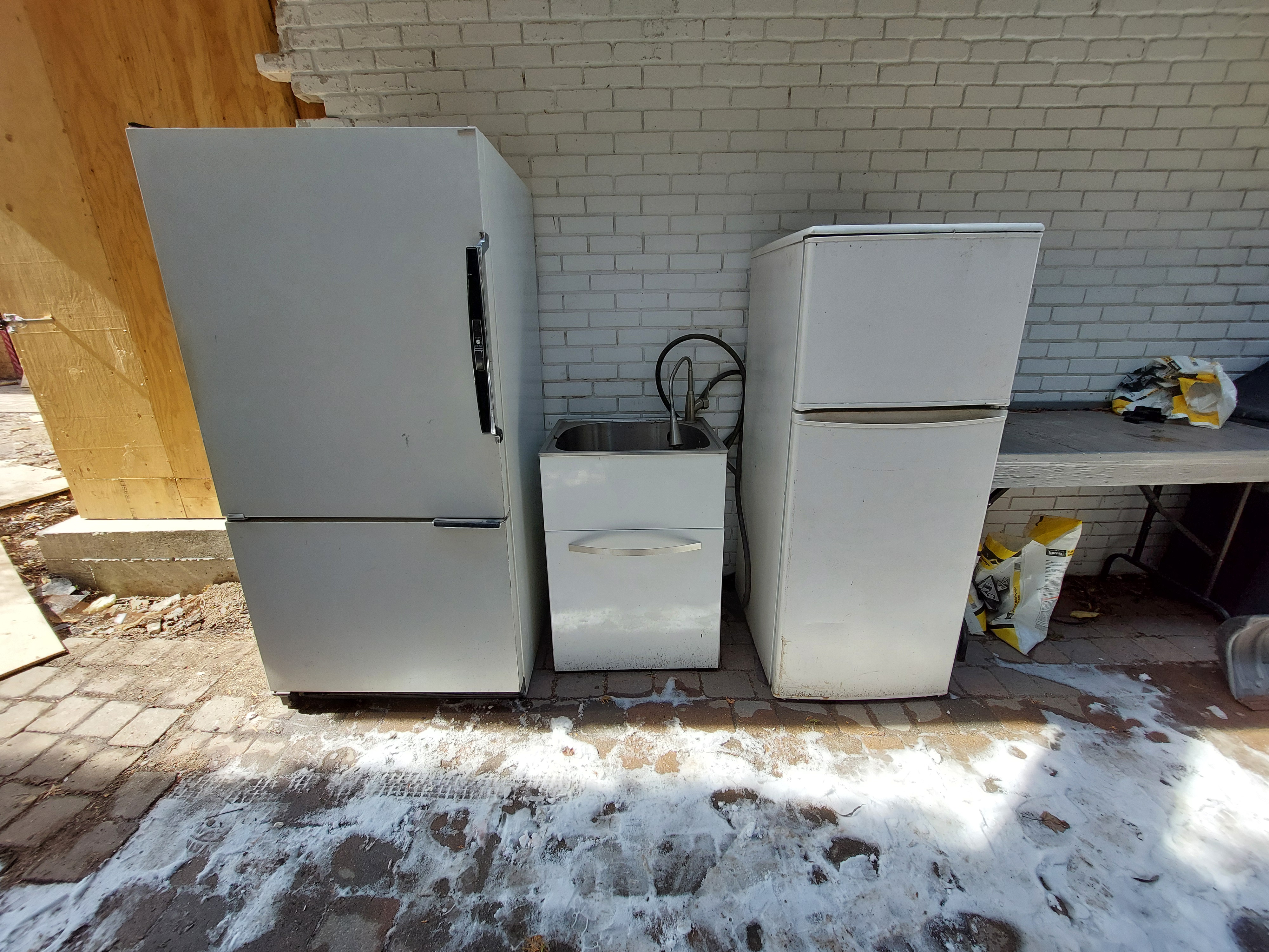 Photo of 2 White Fridges and outdoor sink! 