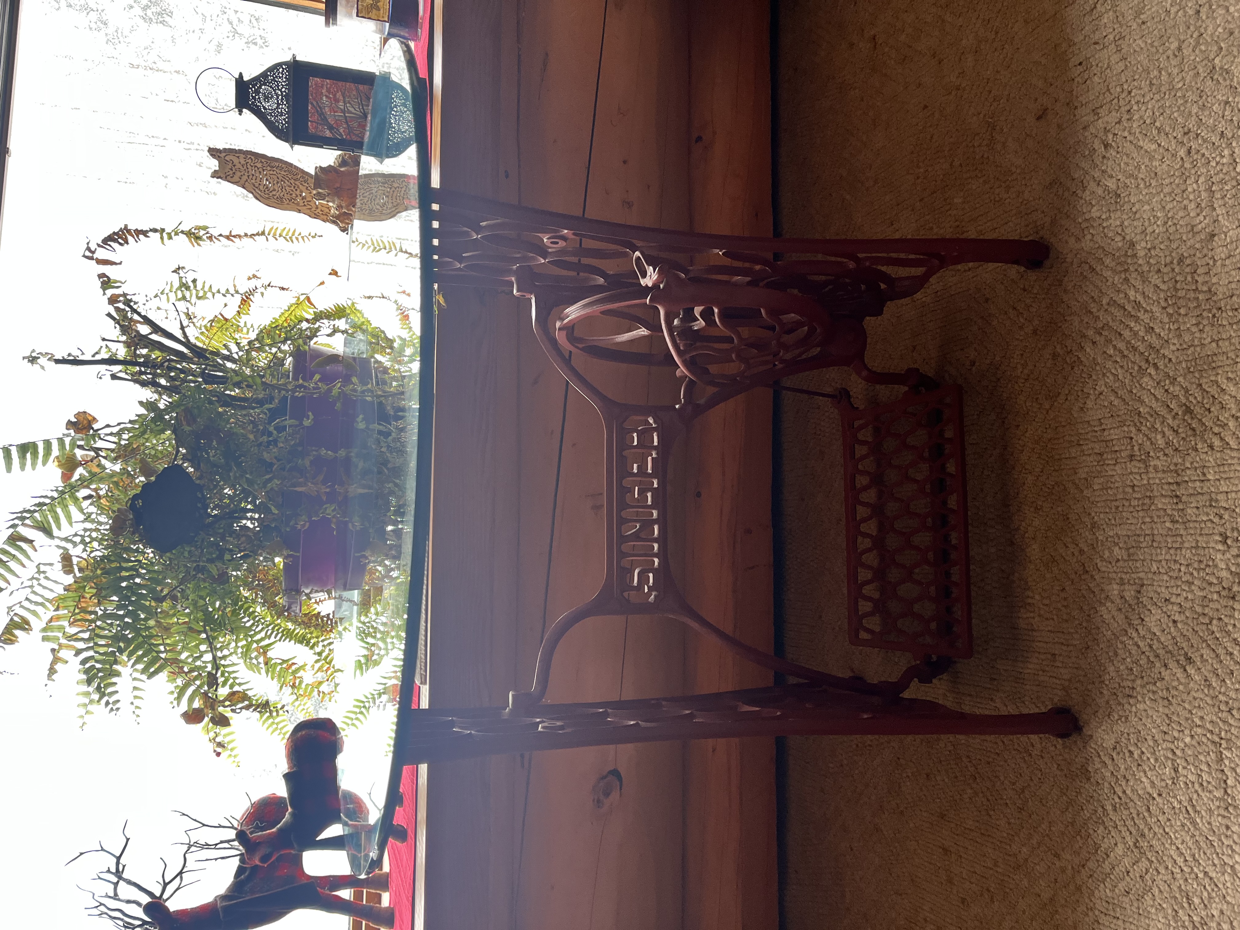 Photo of Treadle sewing machine glass top table