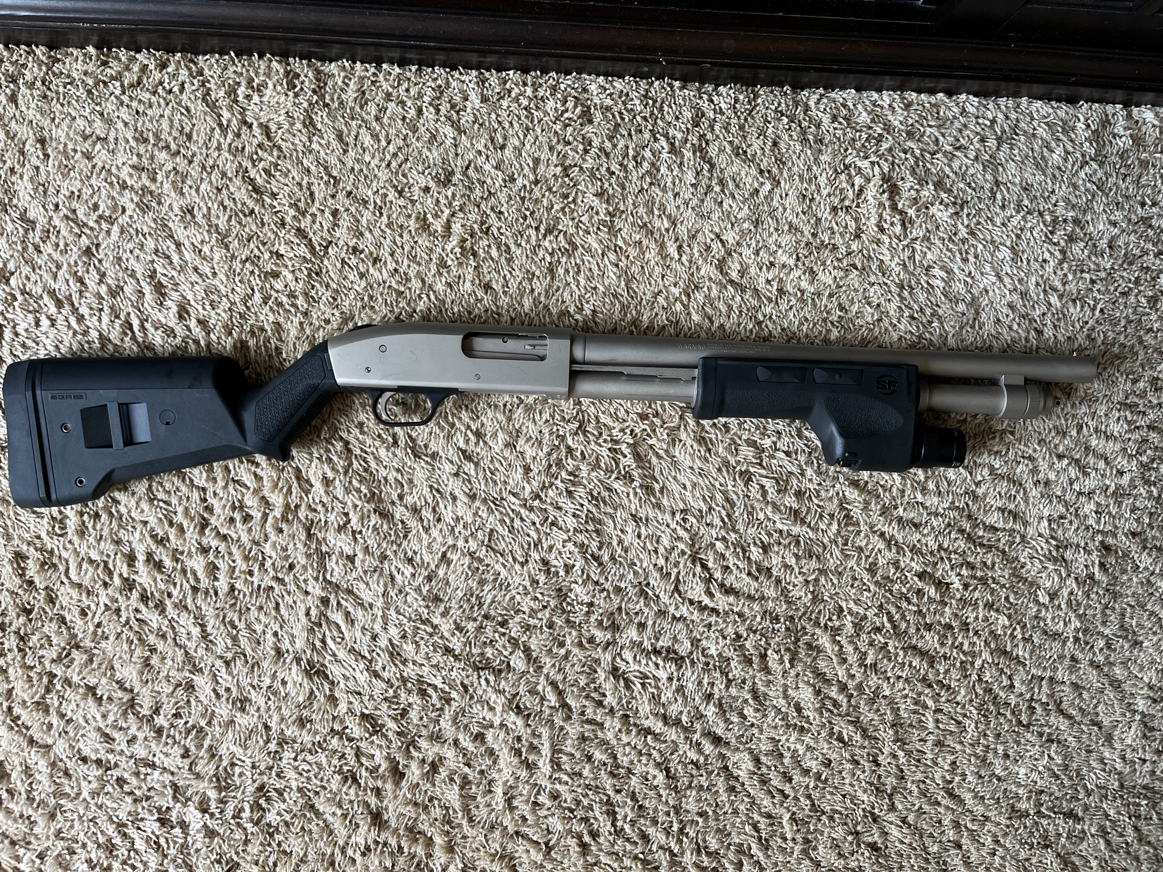 Photo of Mossberg 590A1 Marine Coat W/SureFire Forend, and MagPul SGA Stock
