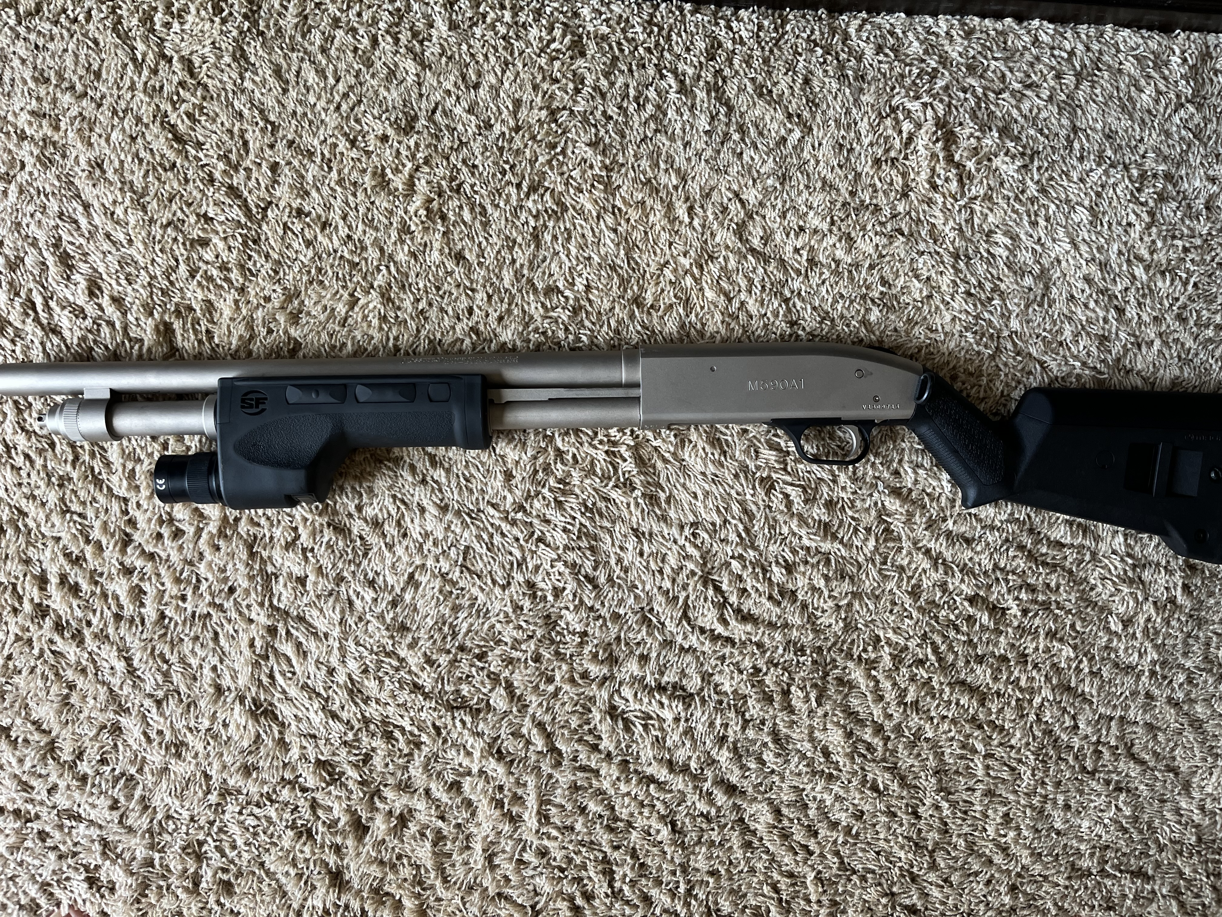 Photo of Mossberg 590A1 Marine Coat W/SureFire Forend, and MagPul SGA Stock
