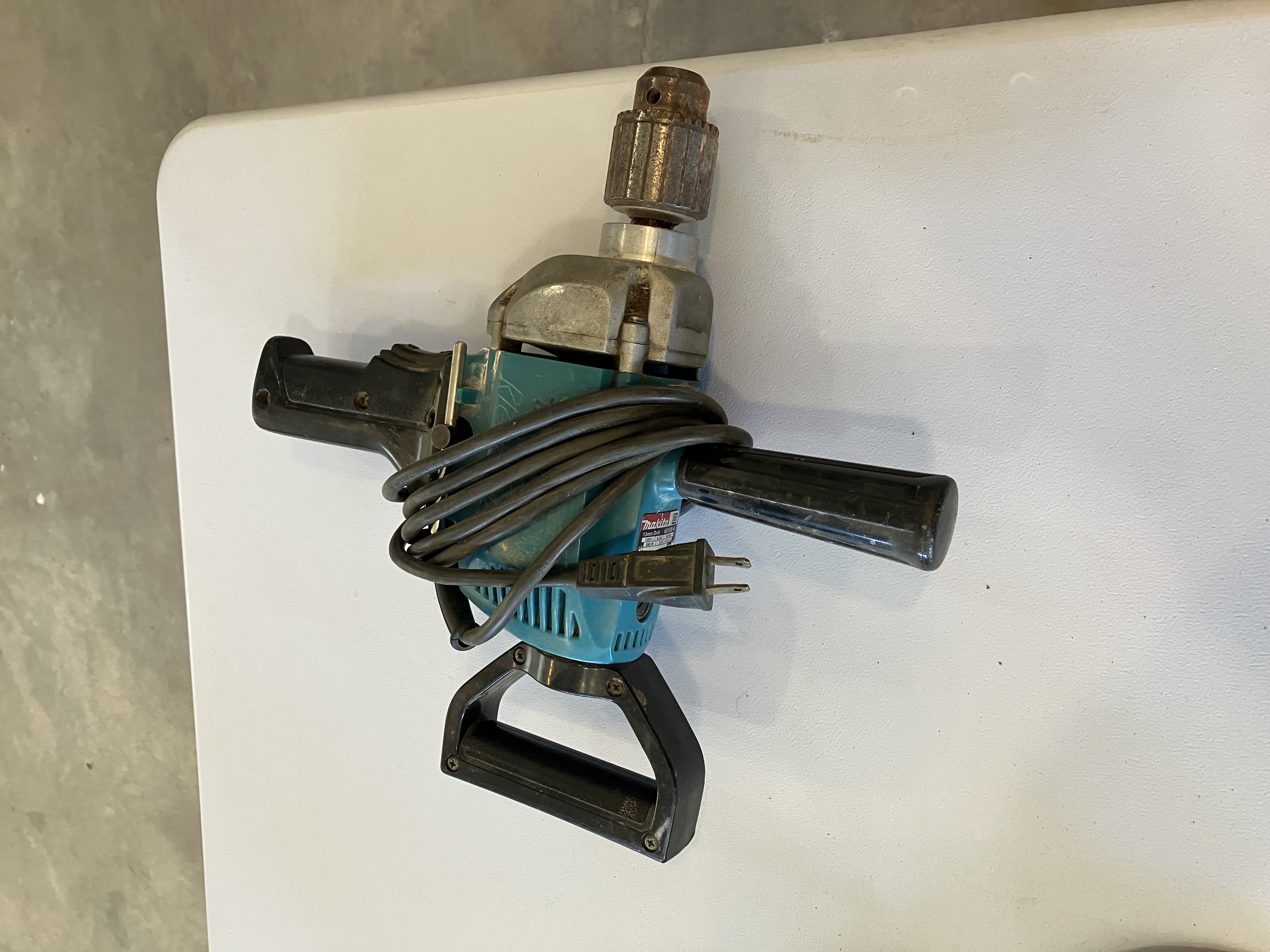 Photo of Angle Grinder Makita 6” as well as a 2 Speed Makita 1/2 inch drive hand drill.