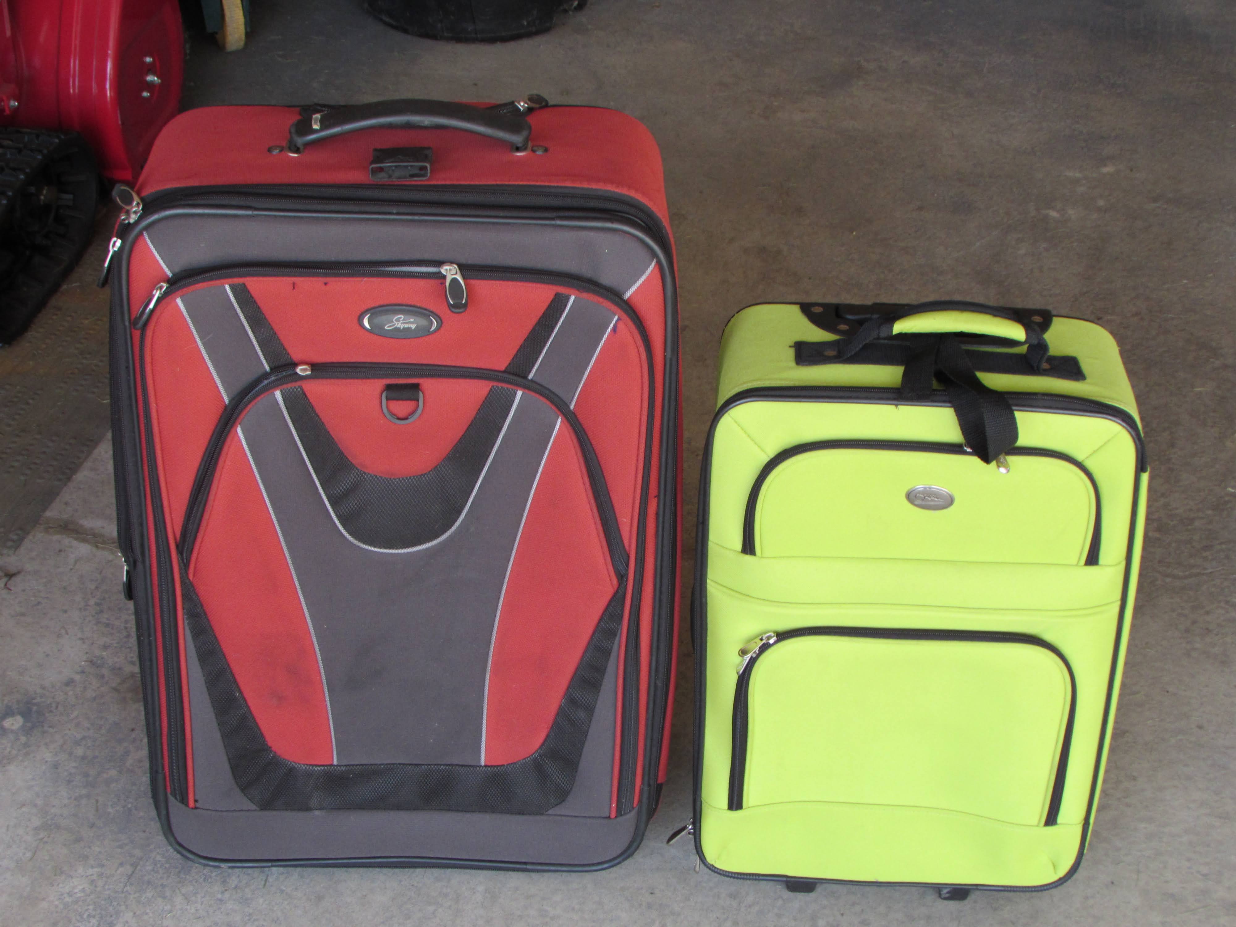 Photo of Set of 2 Suit Cases