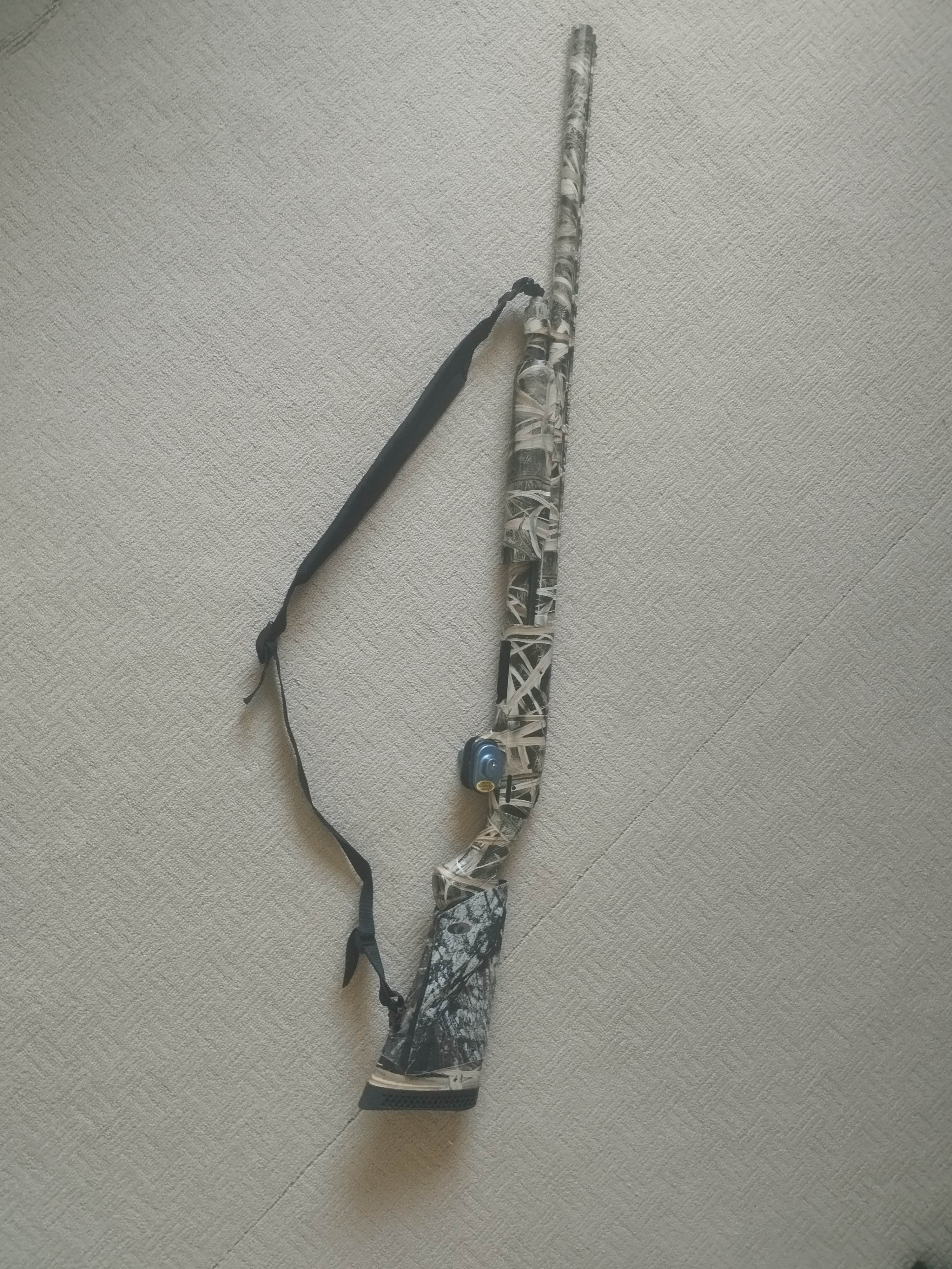 Photo of Mossberg Pump Action Shotgun 12 GA