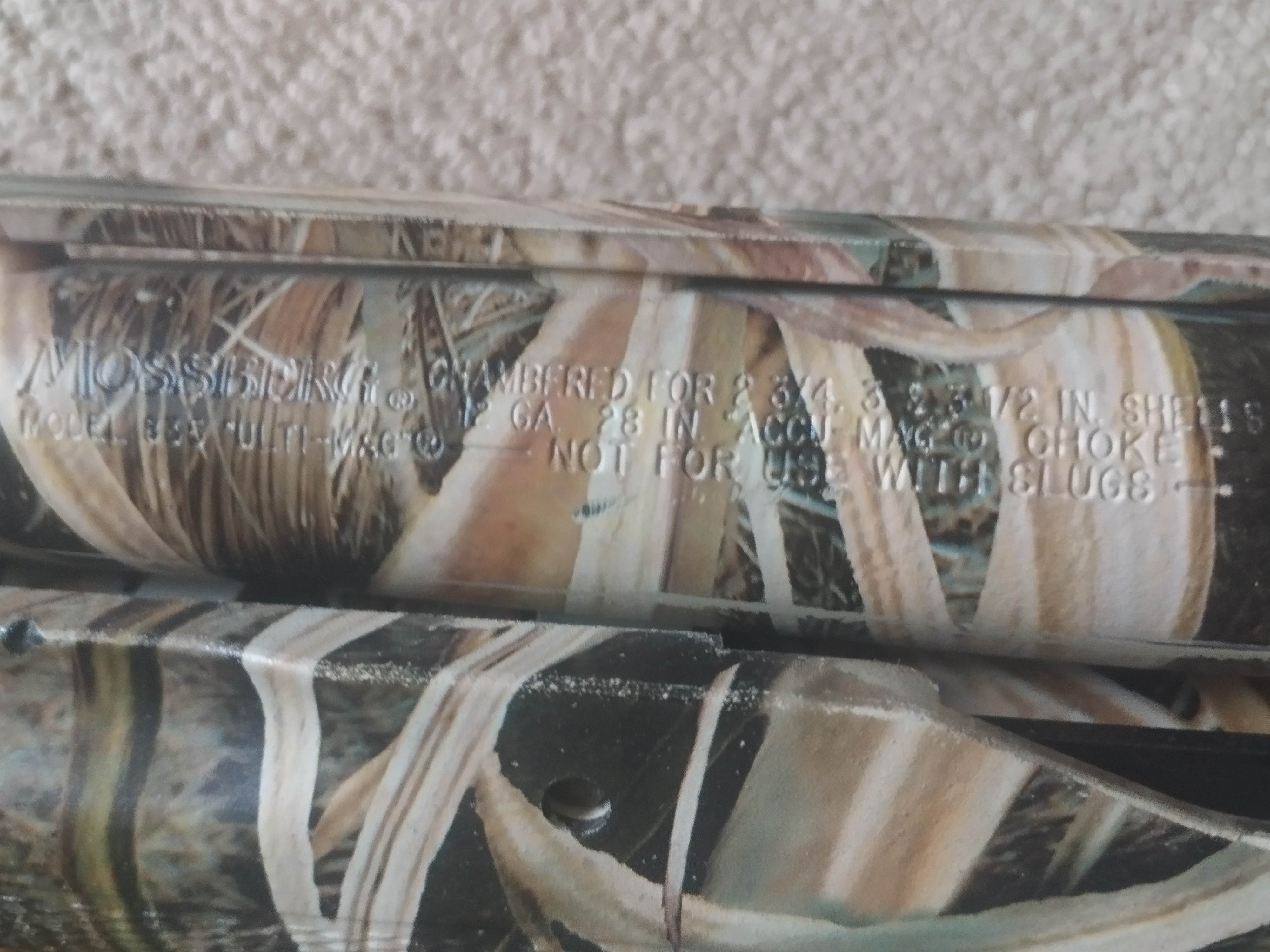 Photo of Mossberg Pump Action Shotgun 12 GA