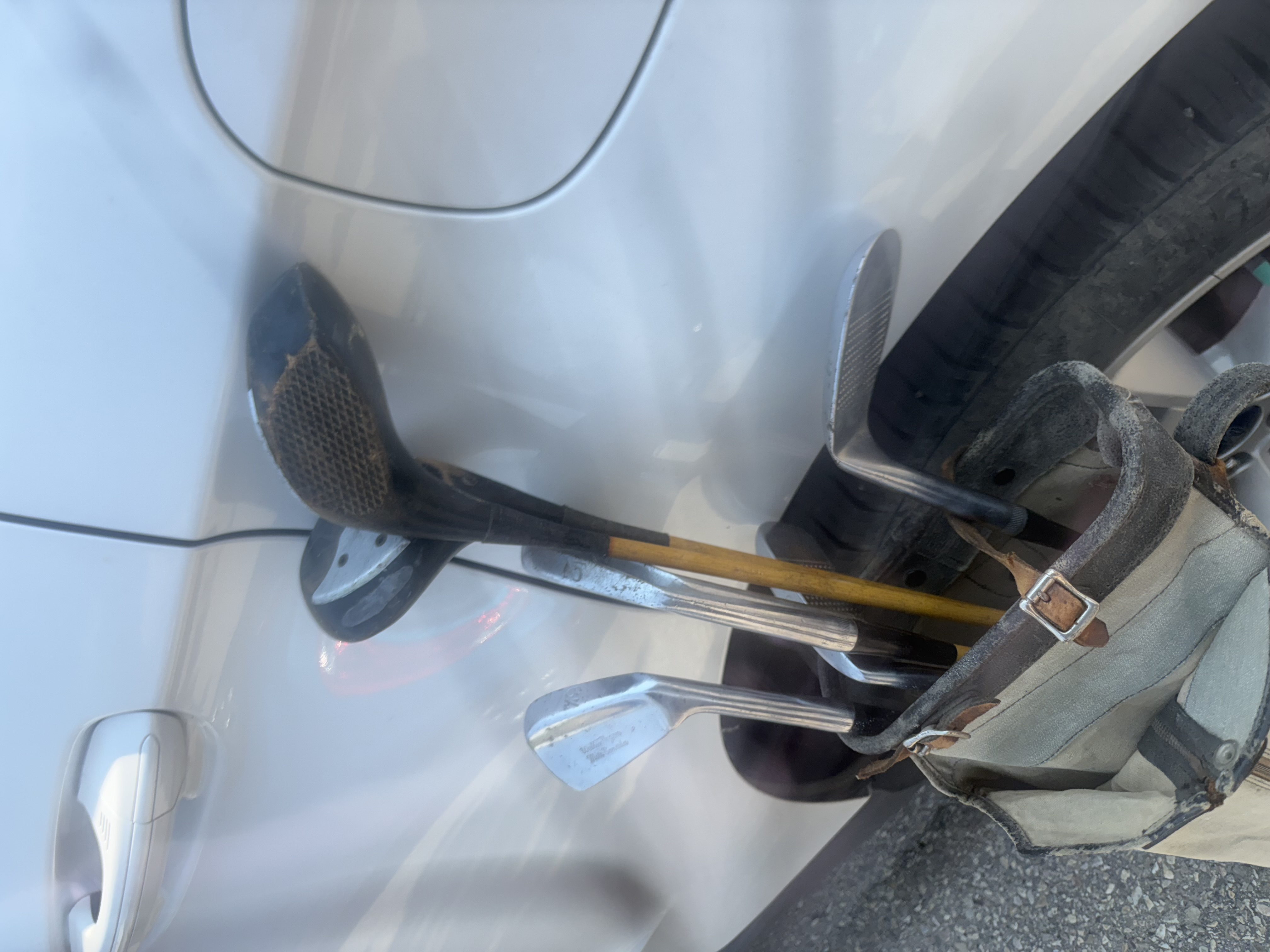 Photo of antique bike, and power tool.