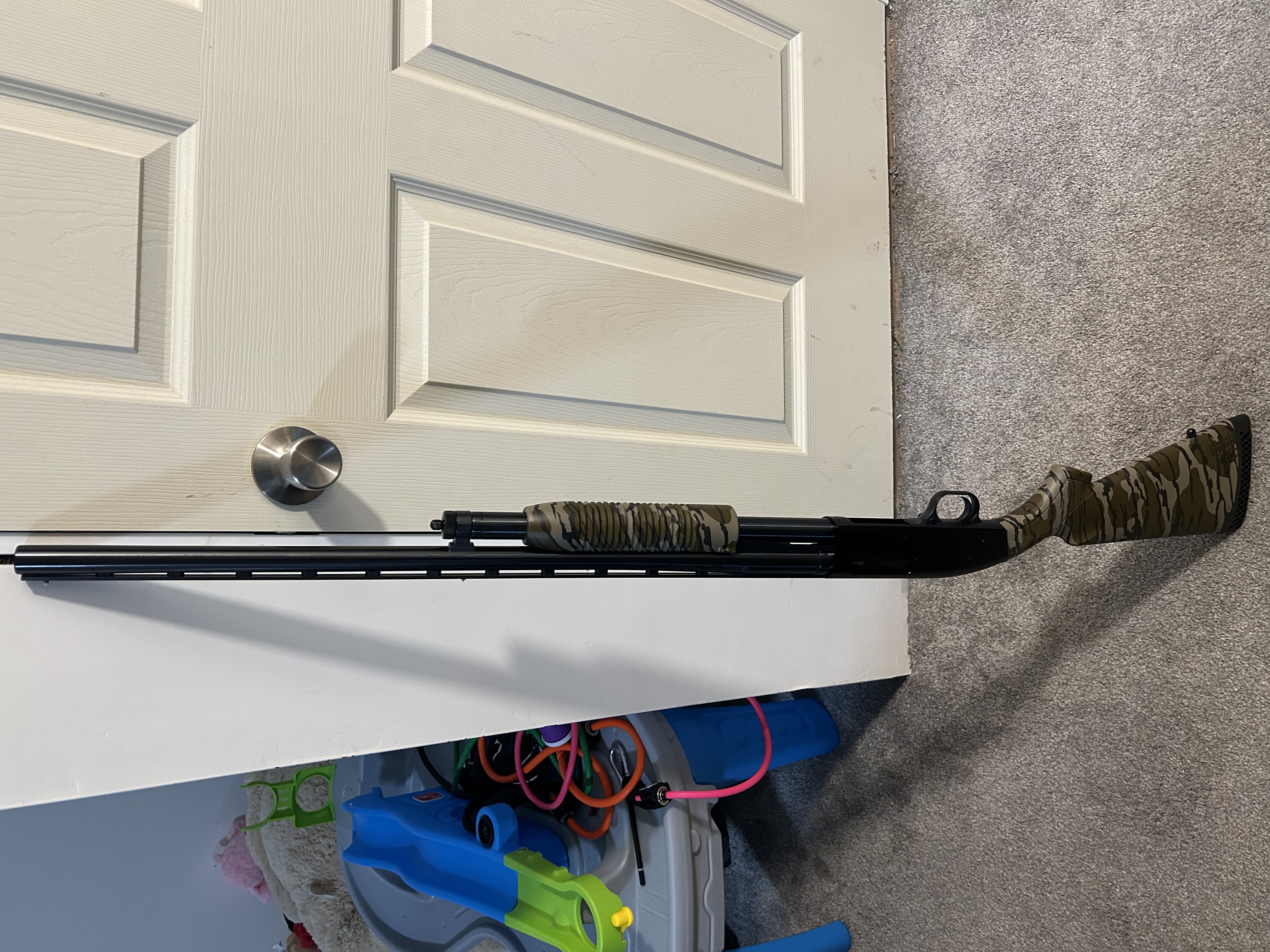 Photo of Mossberg Maverick 88 Mossy Oak Camo