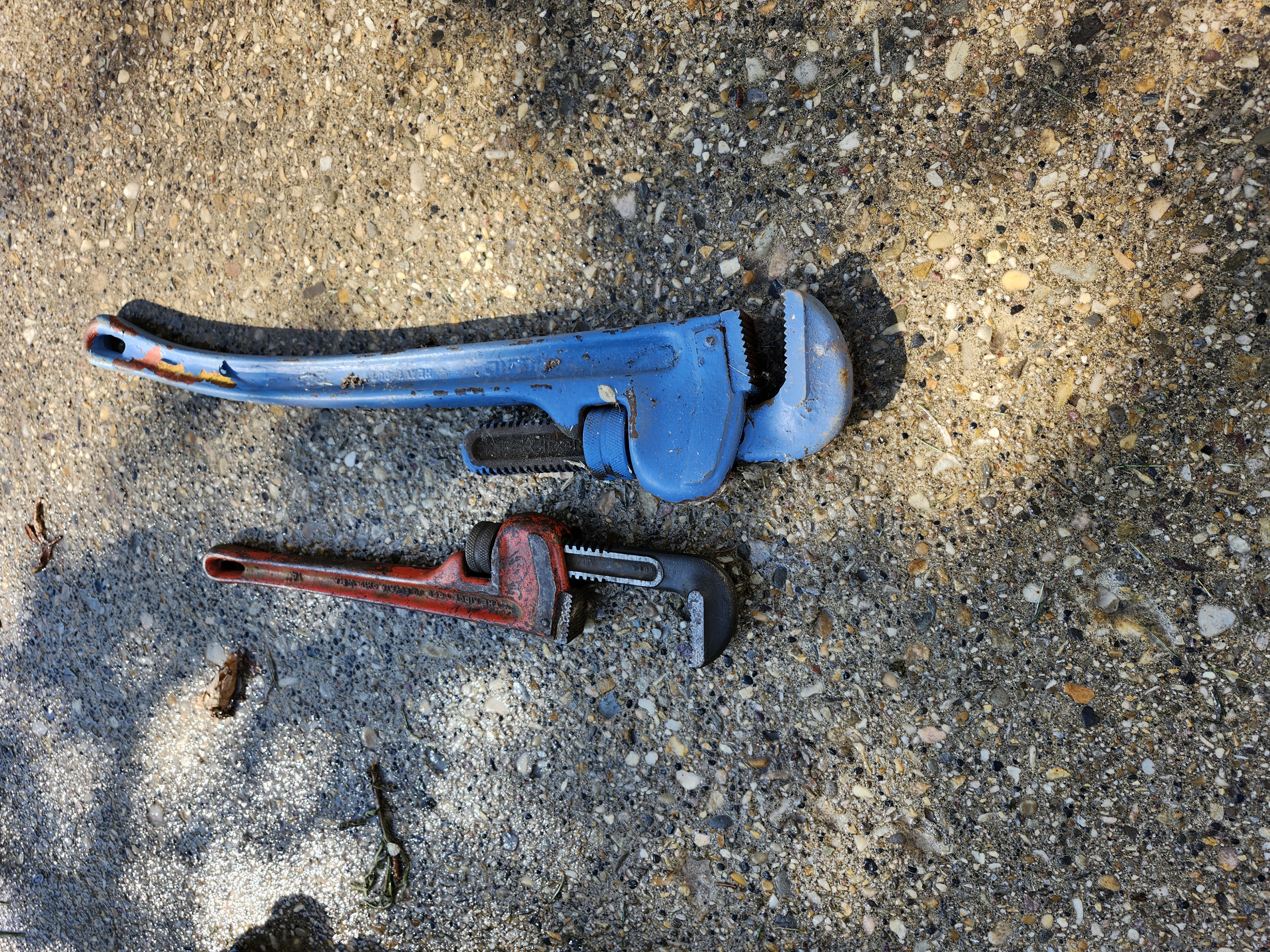 Photo of 2 large pipe wrenches 
