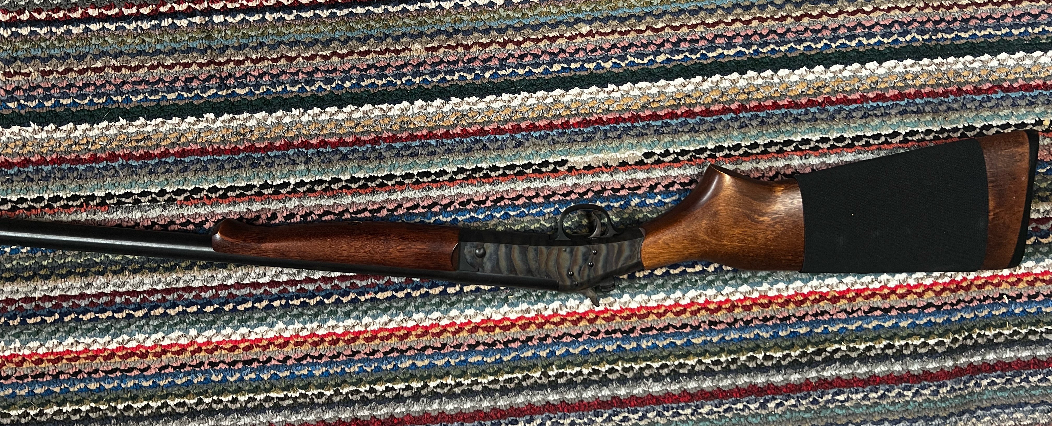 Photo of New England 12  Gauge shot gun 3" full