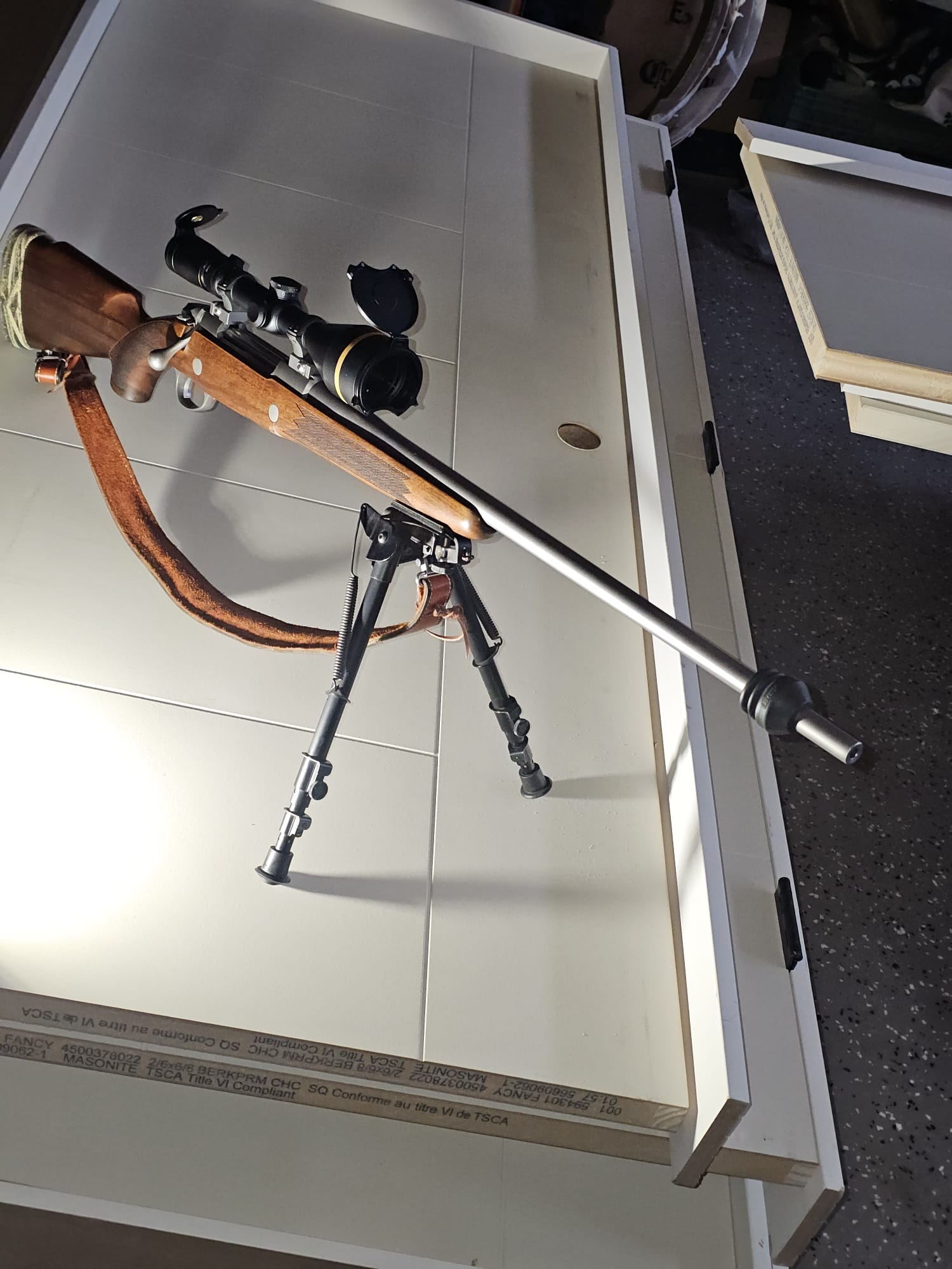 Photo of Sako stainless steel walnut wood rifle