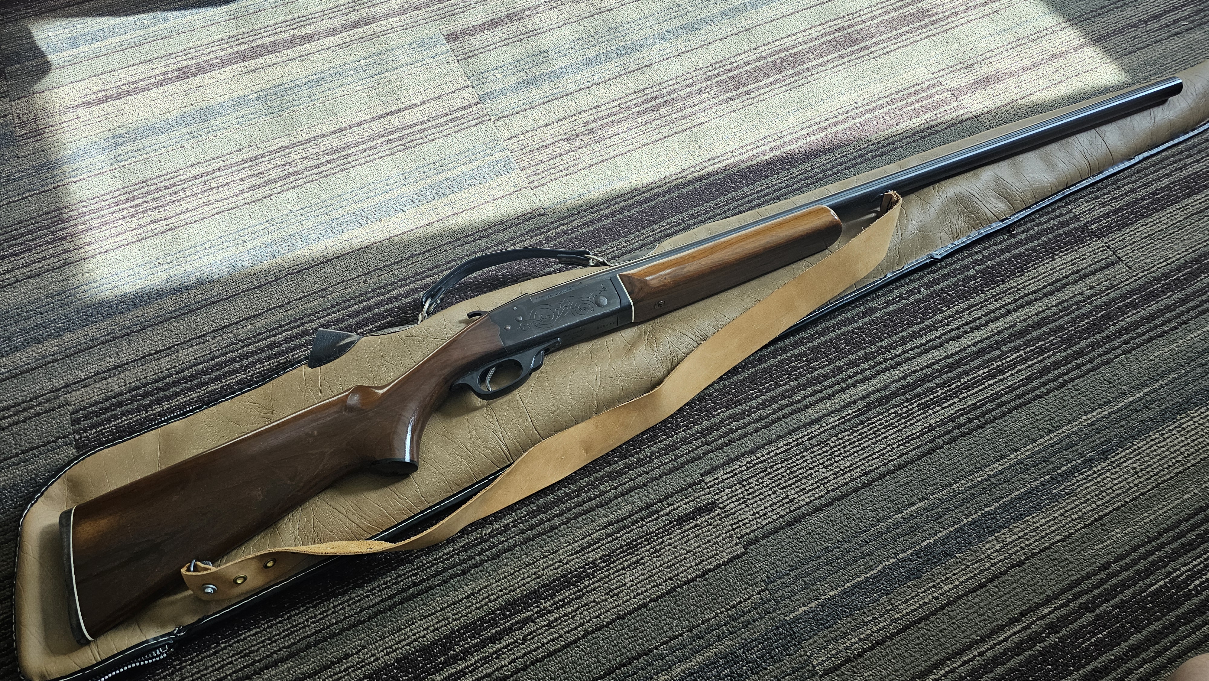 Photo of single shot 12 gauge Brazian shotgun external hammer 