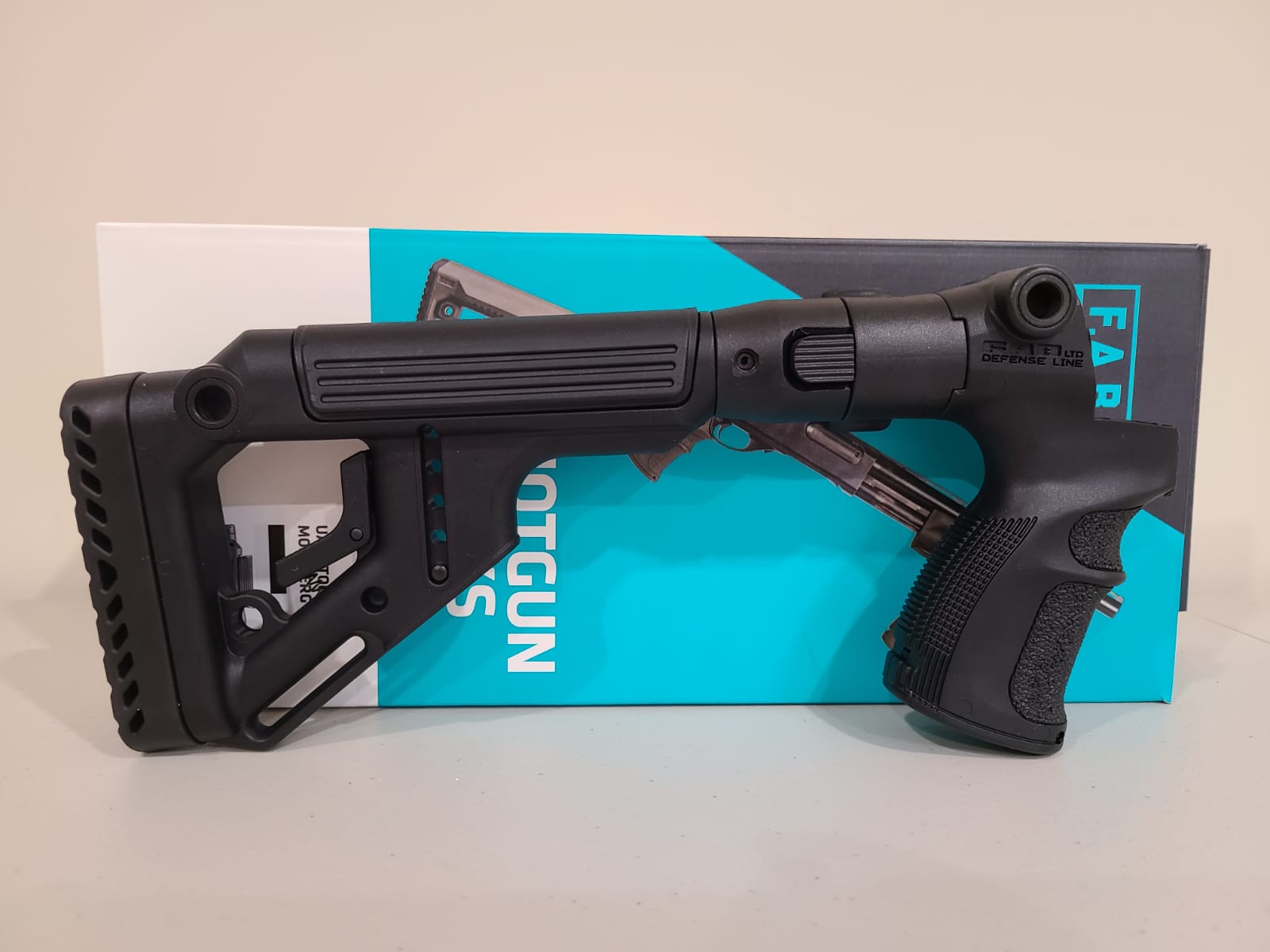 Photo of FAB Defense Stock Tactical Folding with Cheek Riser Mossberg 500, 590, Maverick 88