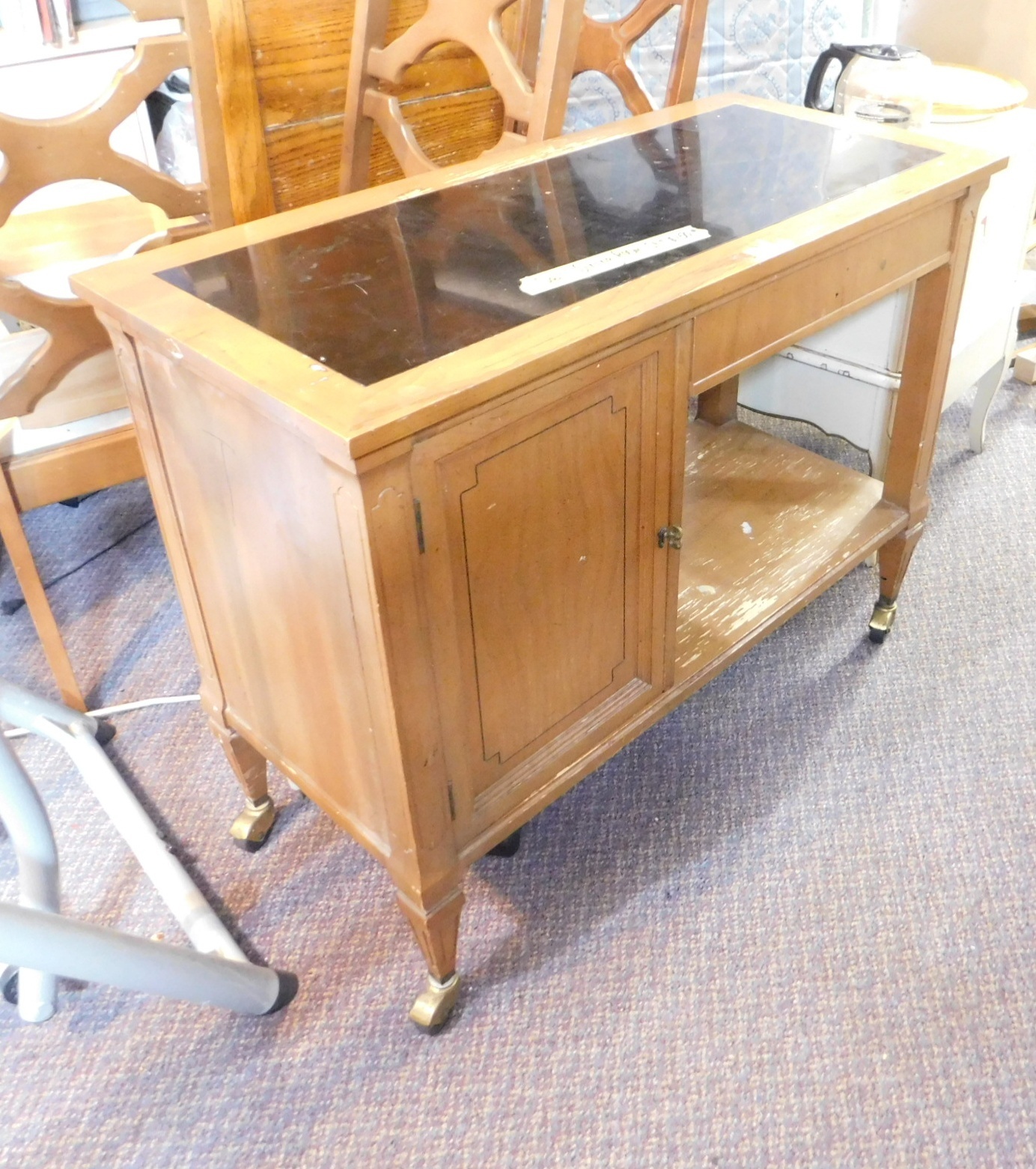 Photo of Vintage Wood Sideboard on Casters – Functional Elegance