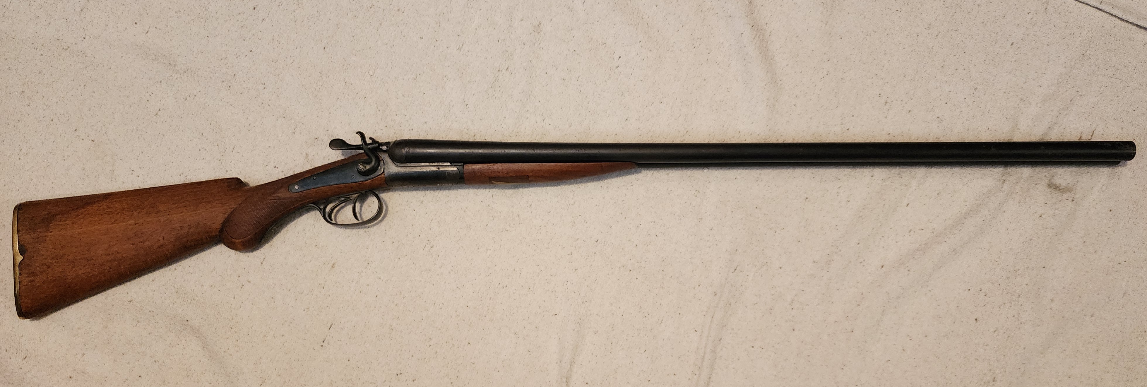 Photo of Belgian made LTH 12 gauge double barrel SxS shotgun