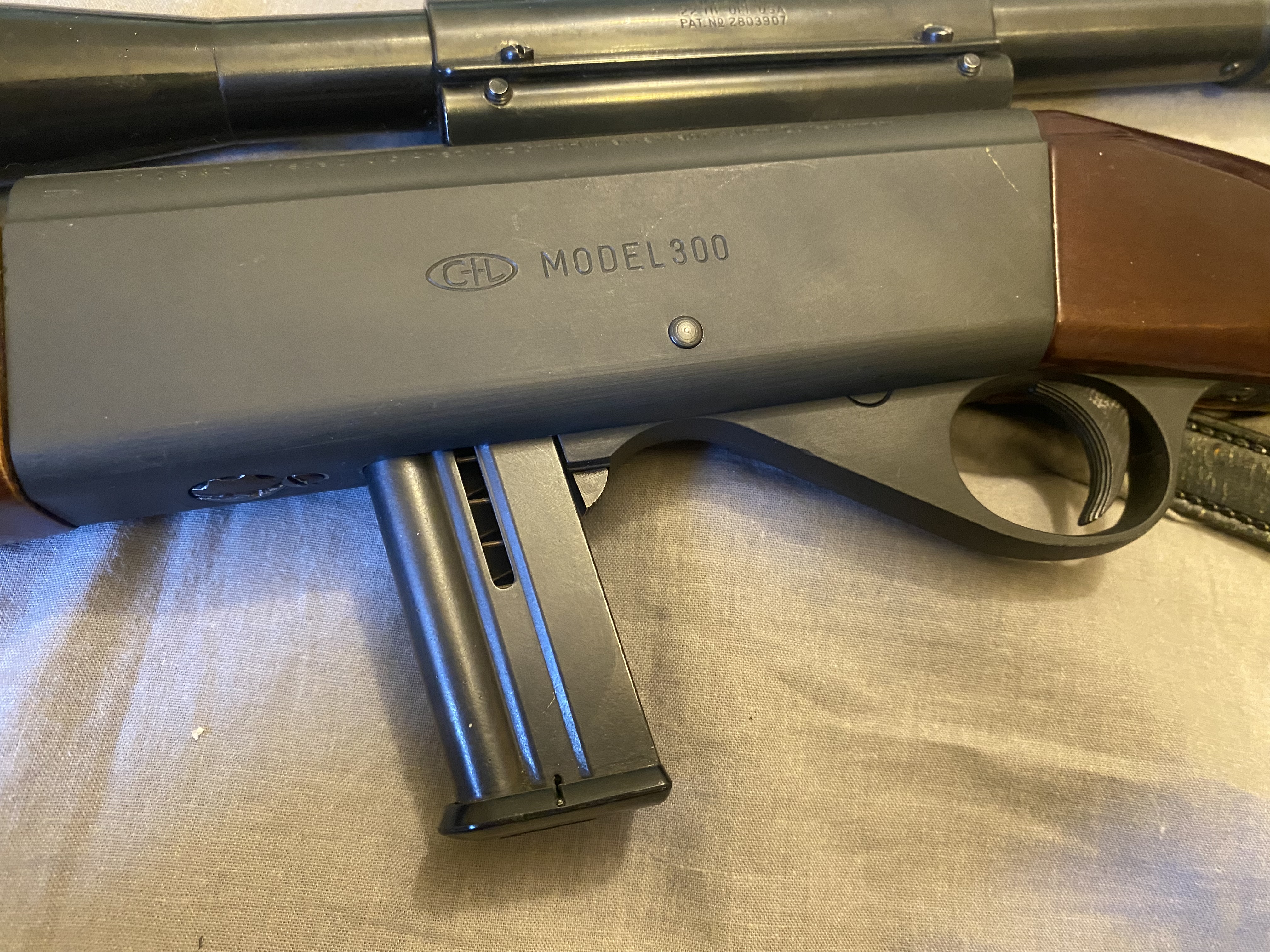 Photo of CIL model300 with fixed power scope