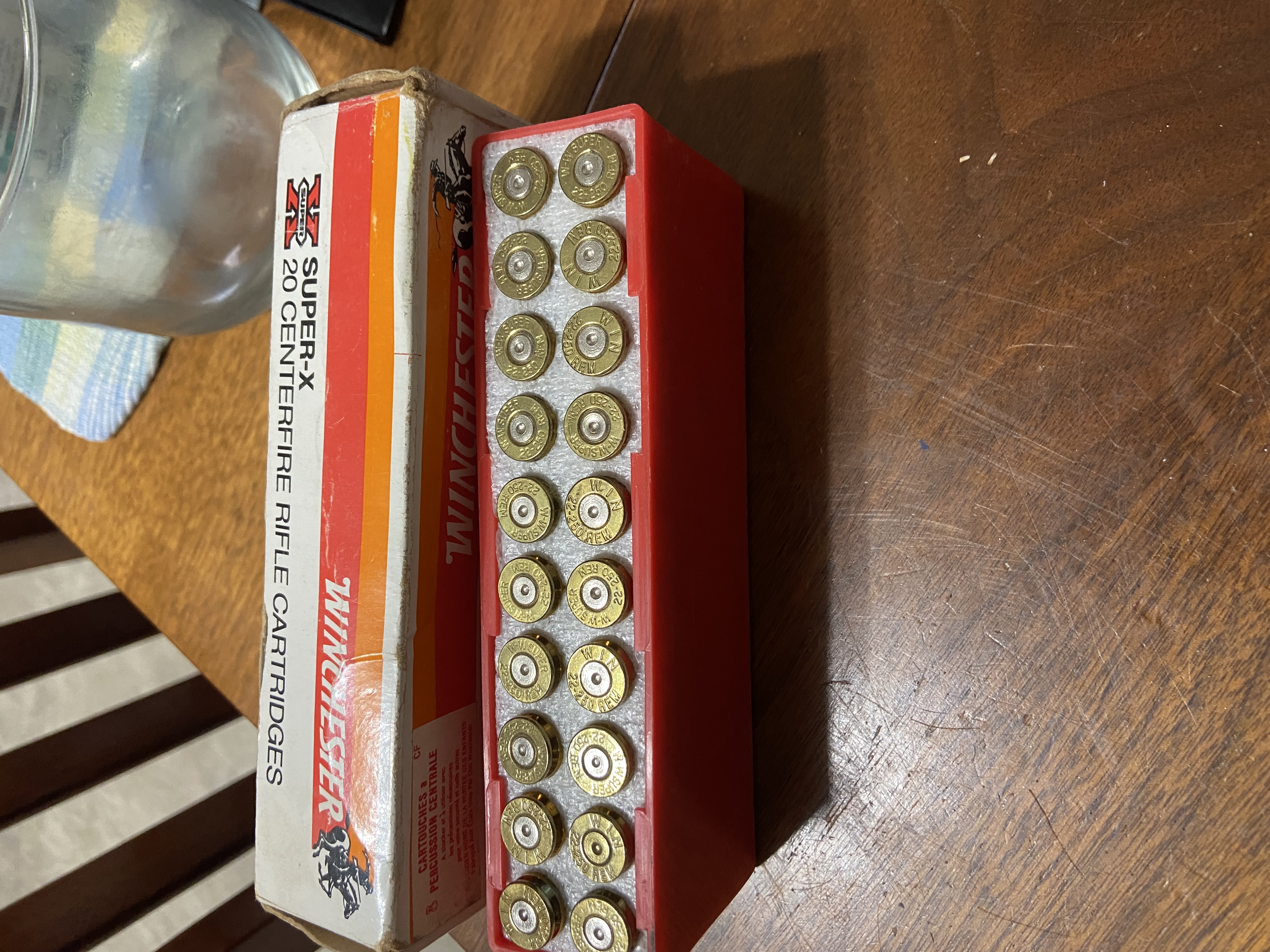 Photo of 22-250 brass and .224 cal bullets