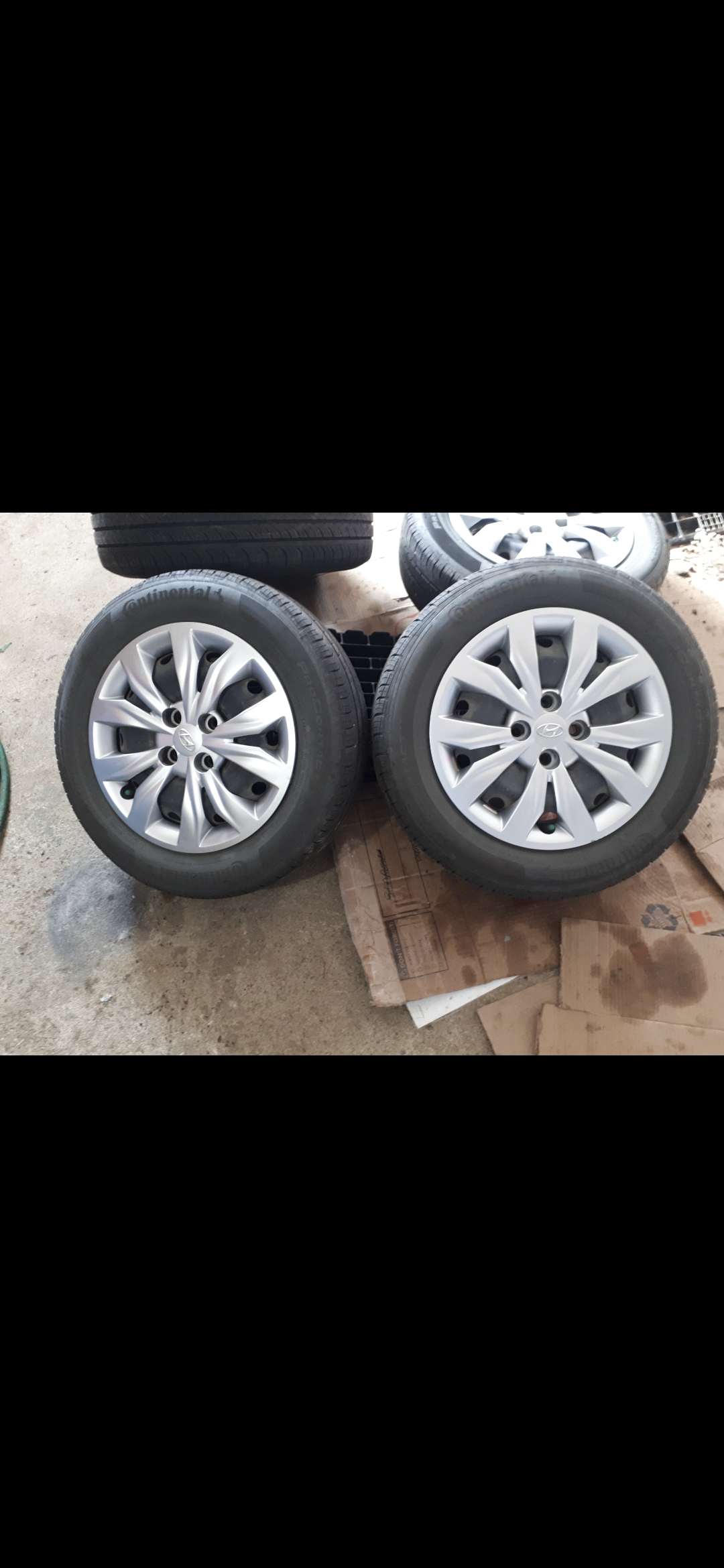 Photo of Rims and tires for a Hyundai accent.