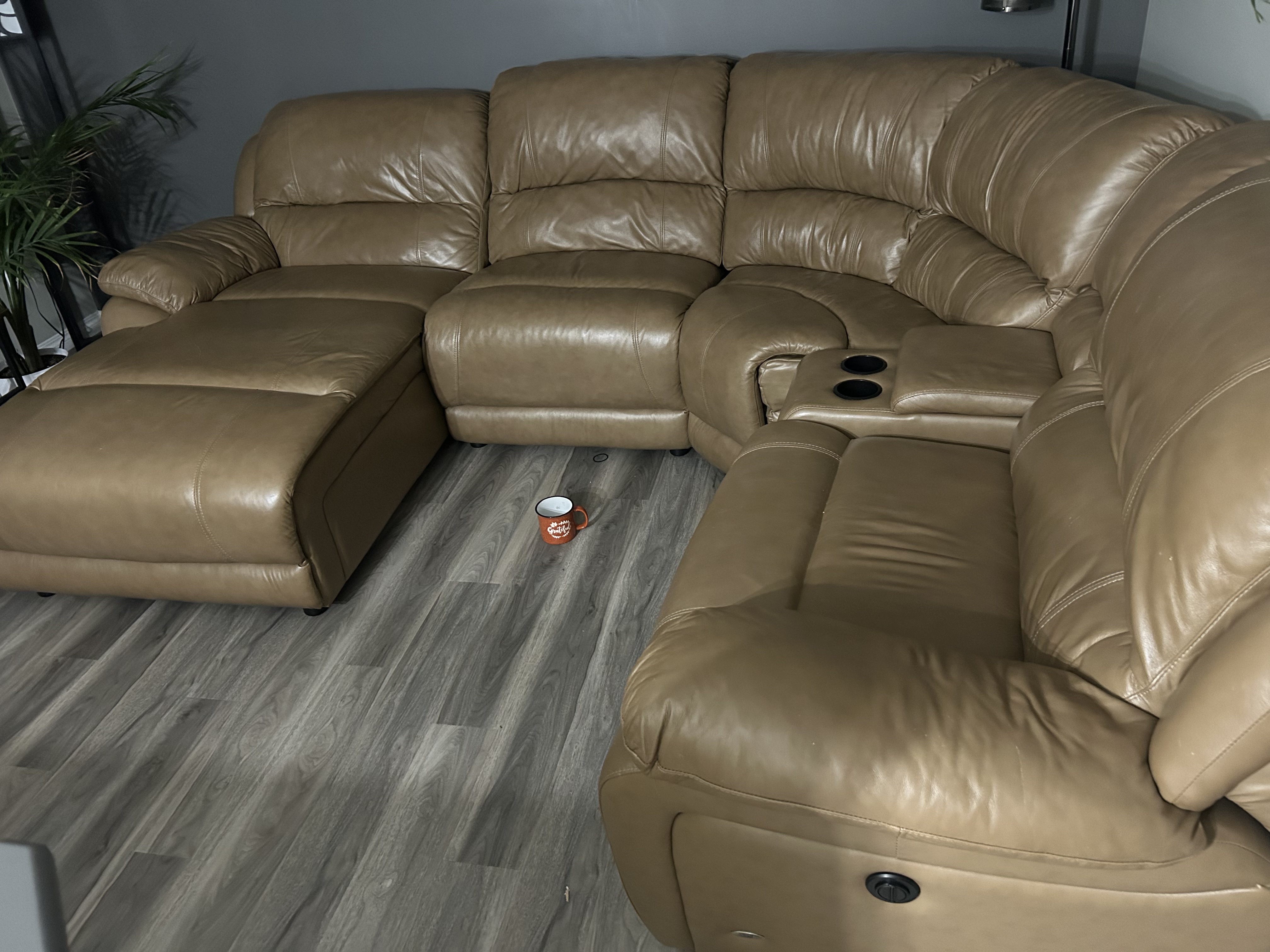 Photo of L shaped sectional, real Lethe’r real coucj