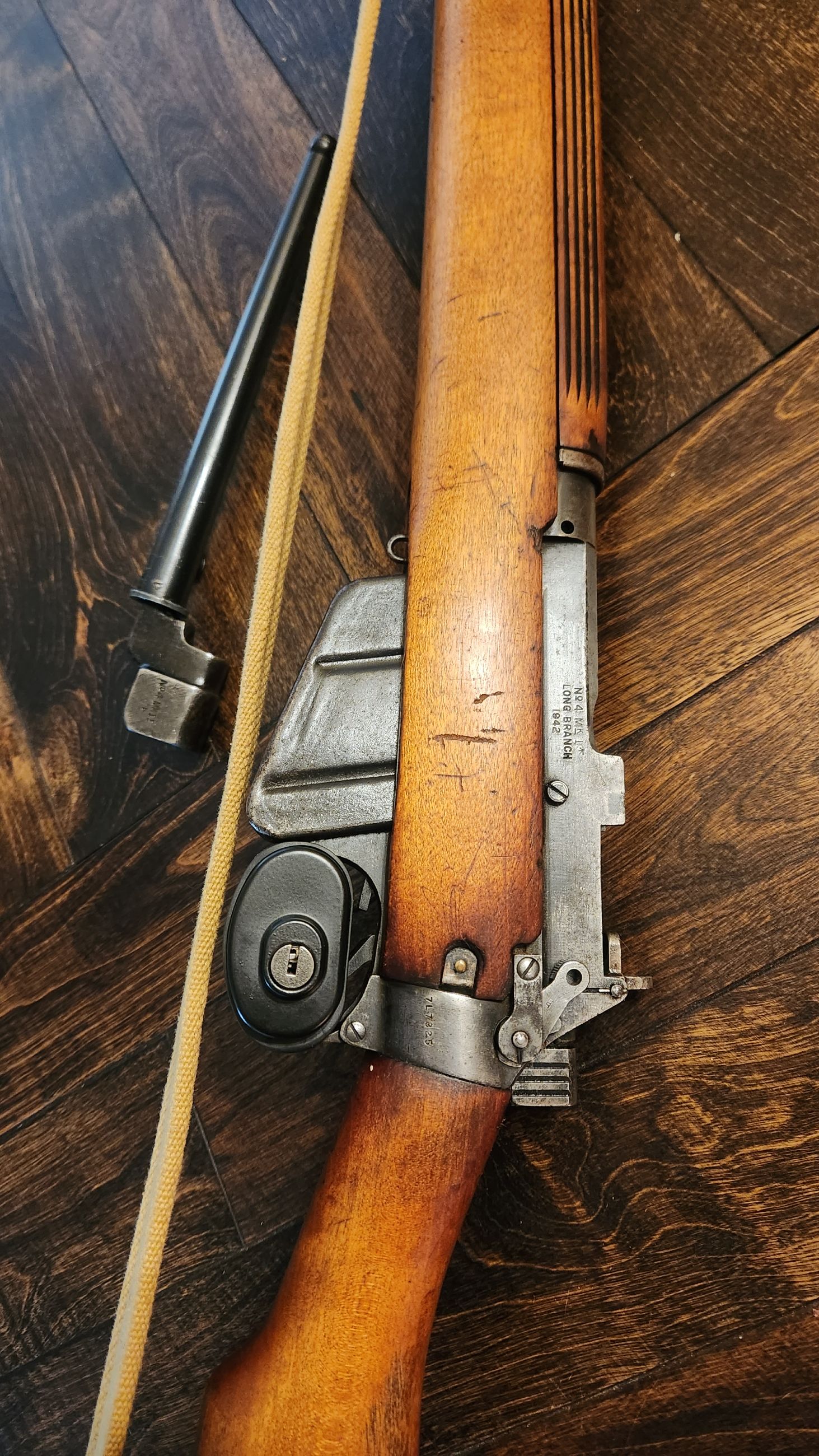 Photo of Lee Enfield #4 mark 1 1942 Longbranch .303 British W/LB spike bayonet and 1-10 round magazine