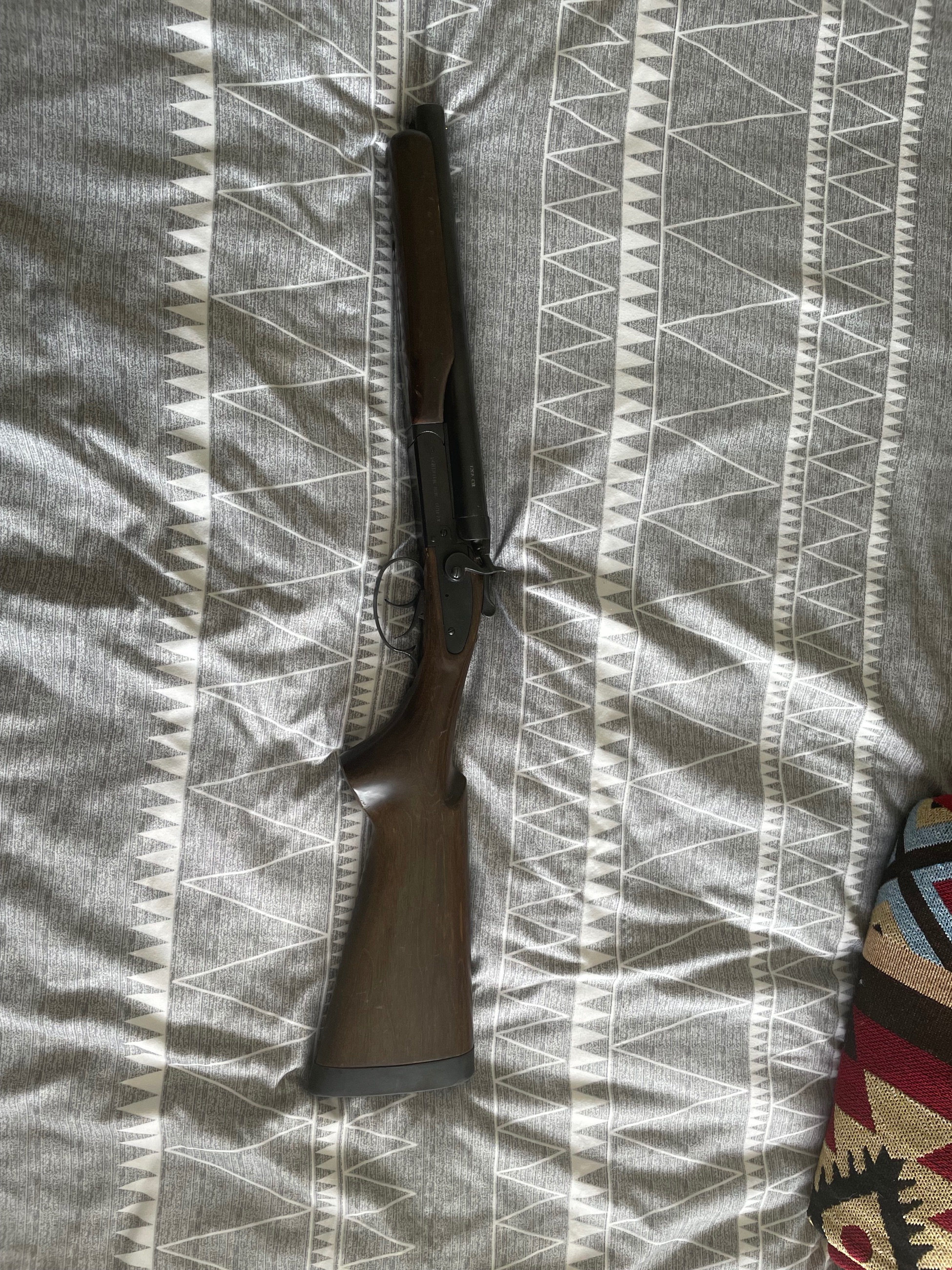 Photo of Side by side 12 gauge coach shotgun 