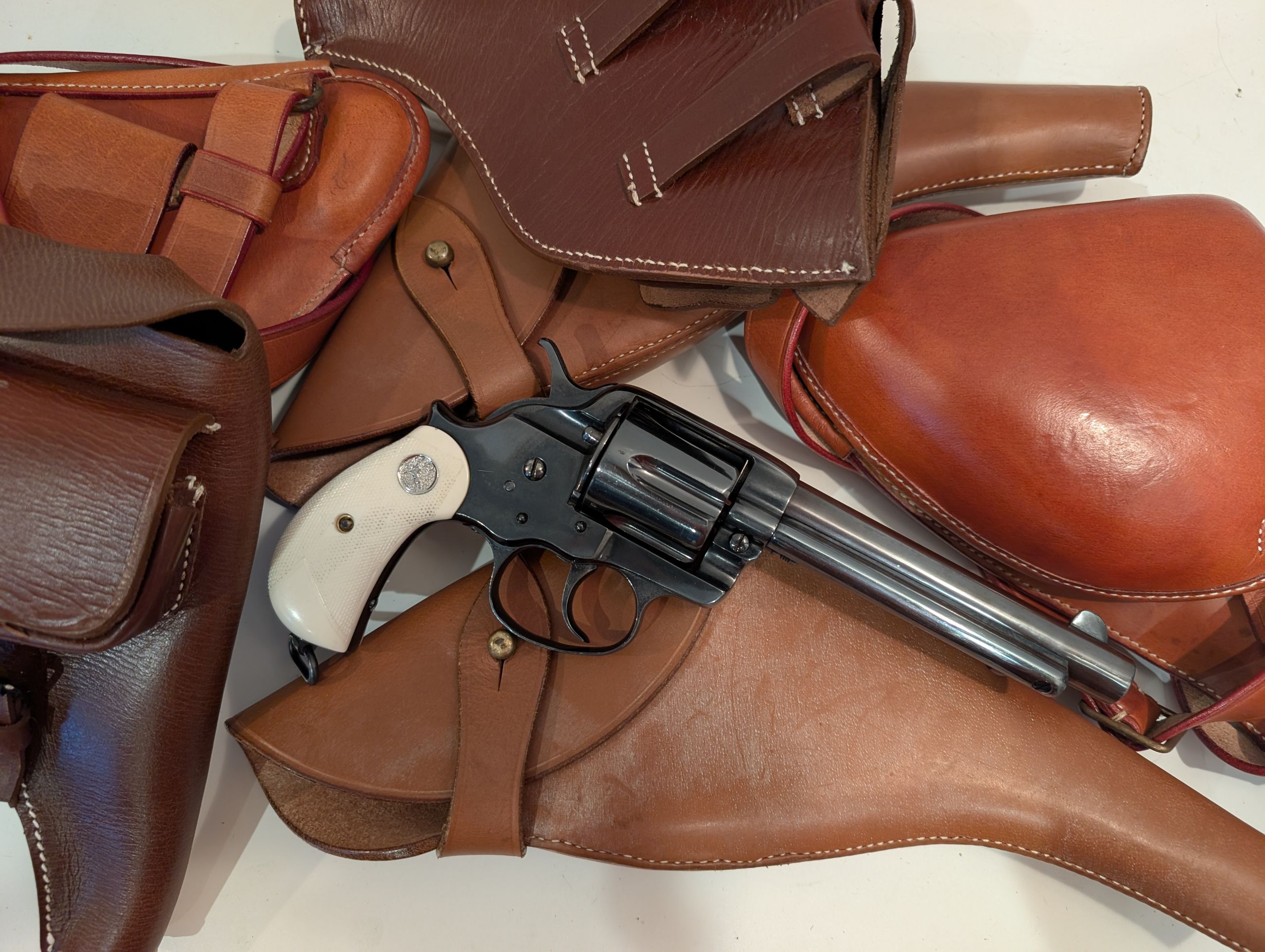 Photo of Leather Hip Shoulder Holsters for Antique Webley, Smith & Wesson, Colt, Remington, Nagant, French / Japanese / German Service Revolvers and more types