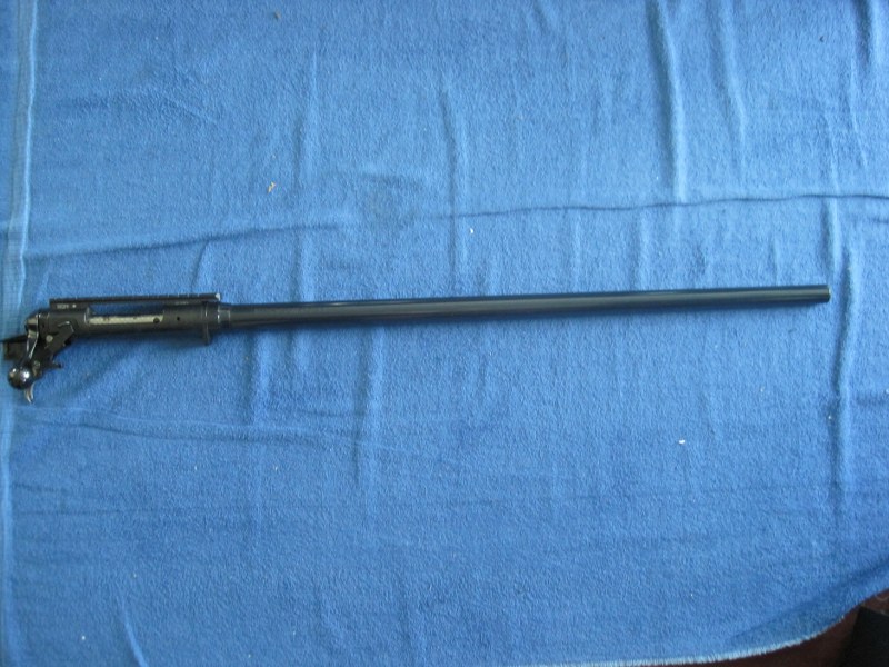 Photo of Savage model 12 22-250 bolt barreled action.