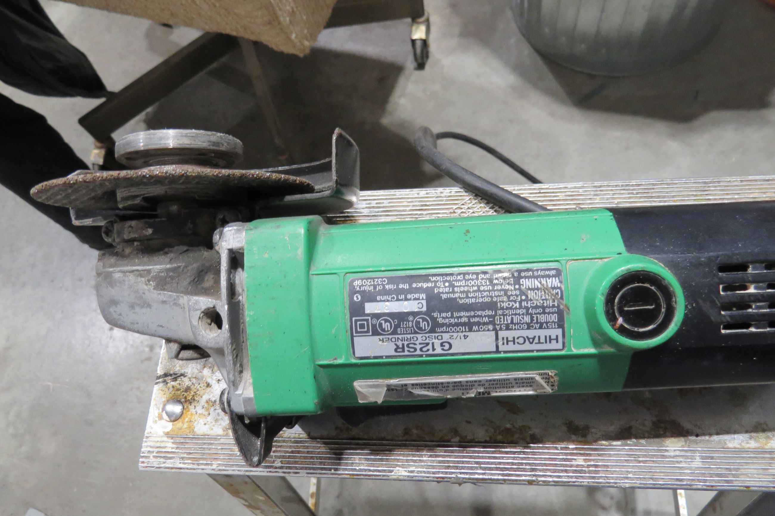 Photo of Hitaci 4 1\2 inch angle grinder 