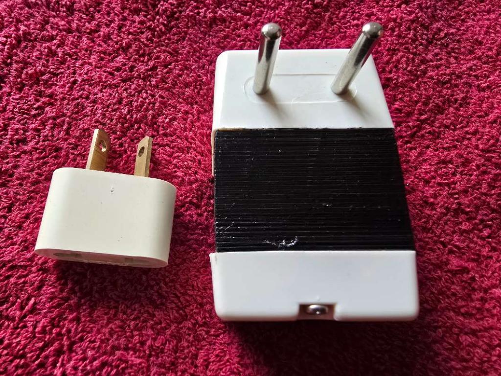 Photo of VOLTAGE CONVERTER FOR OVERSEAS TRAVEL