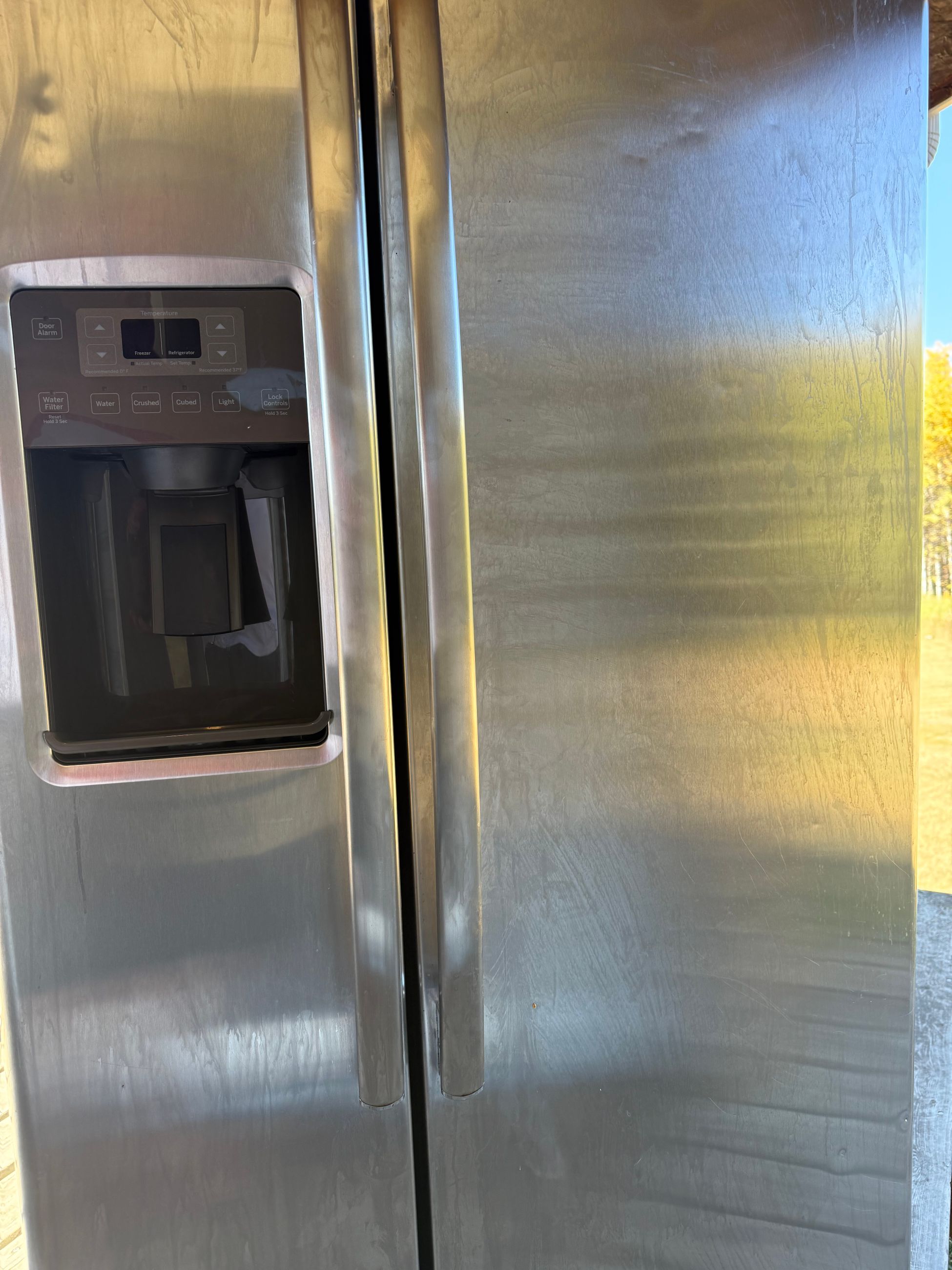 Photo of GE 23.2 Cu. Ft. Side-By-Side Refrigerator