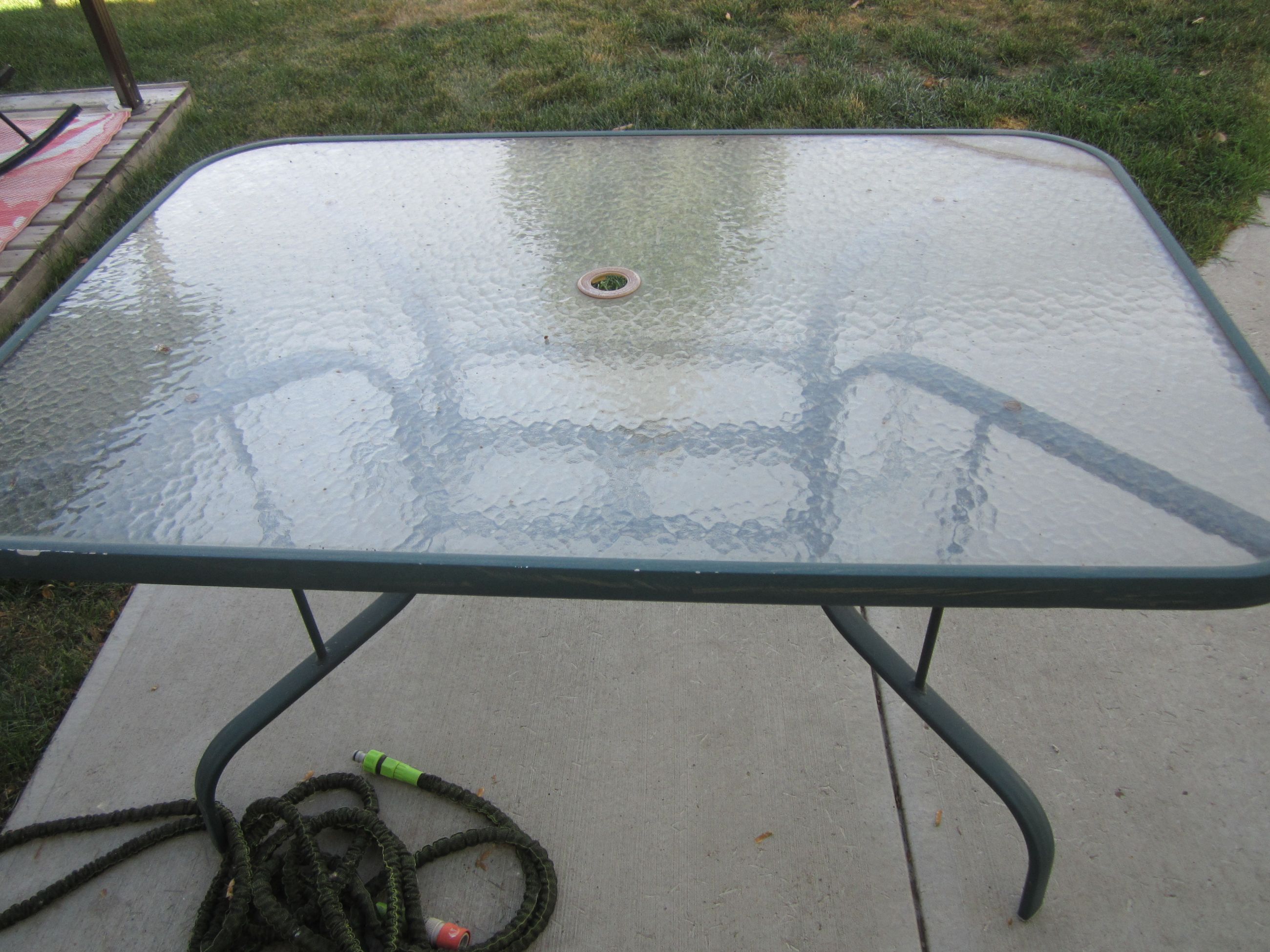 Photo of Patio table and 4 chairs