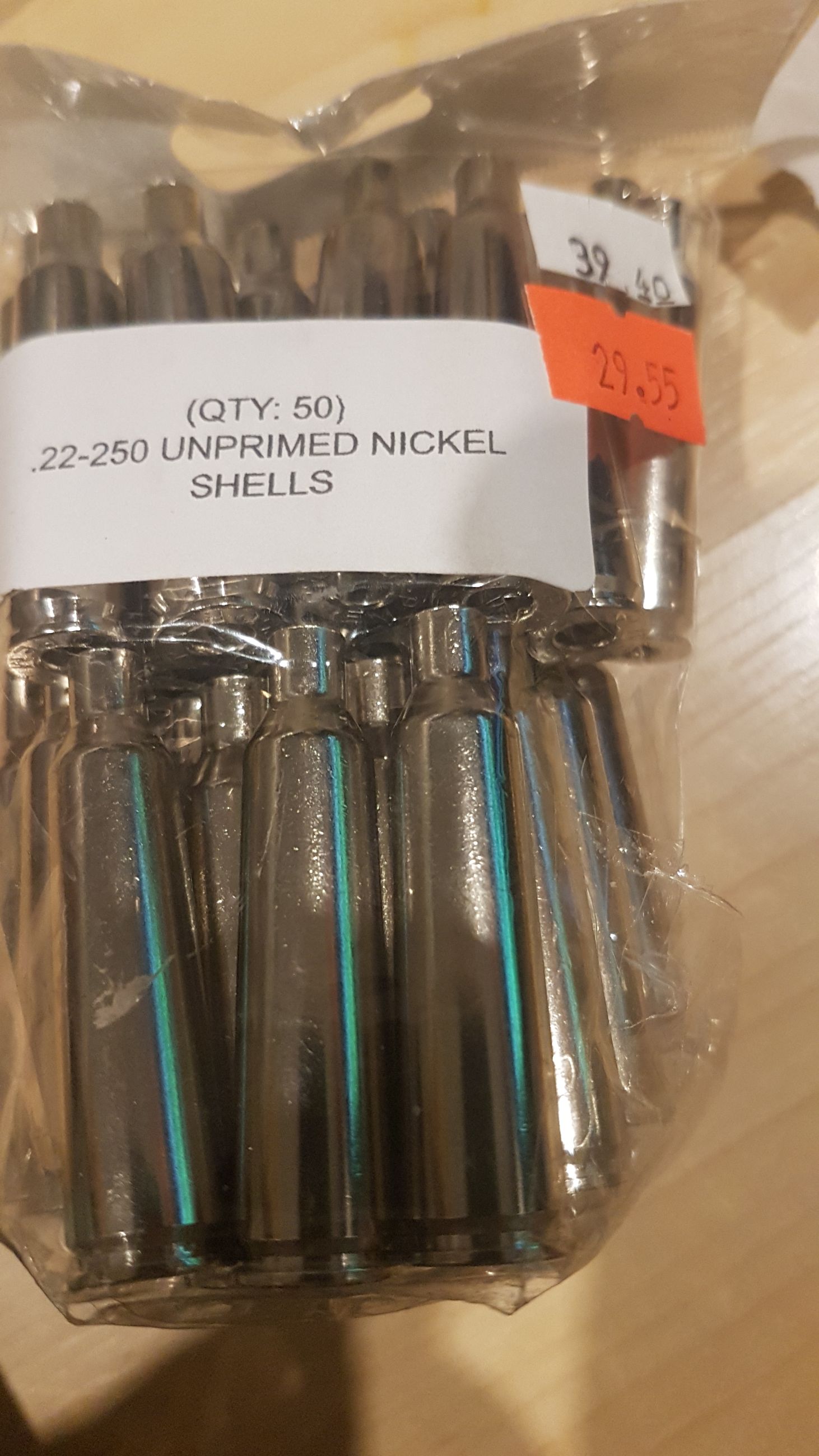 Photo of 1pkg. (50ct.) .22-250 unprimed nickel-plated brass casings ( mellonRSCA)