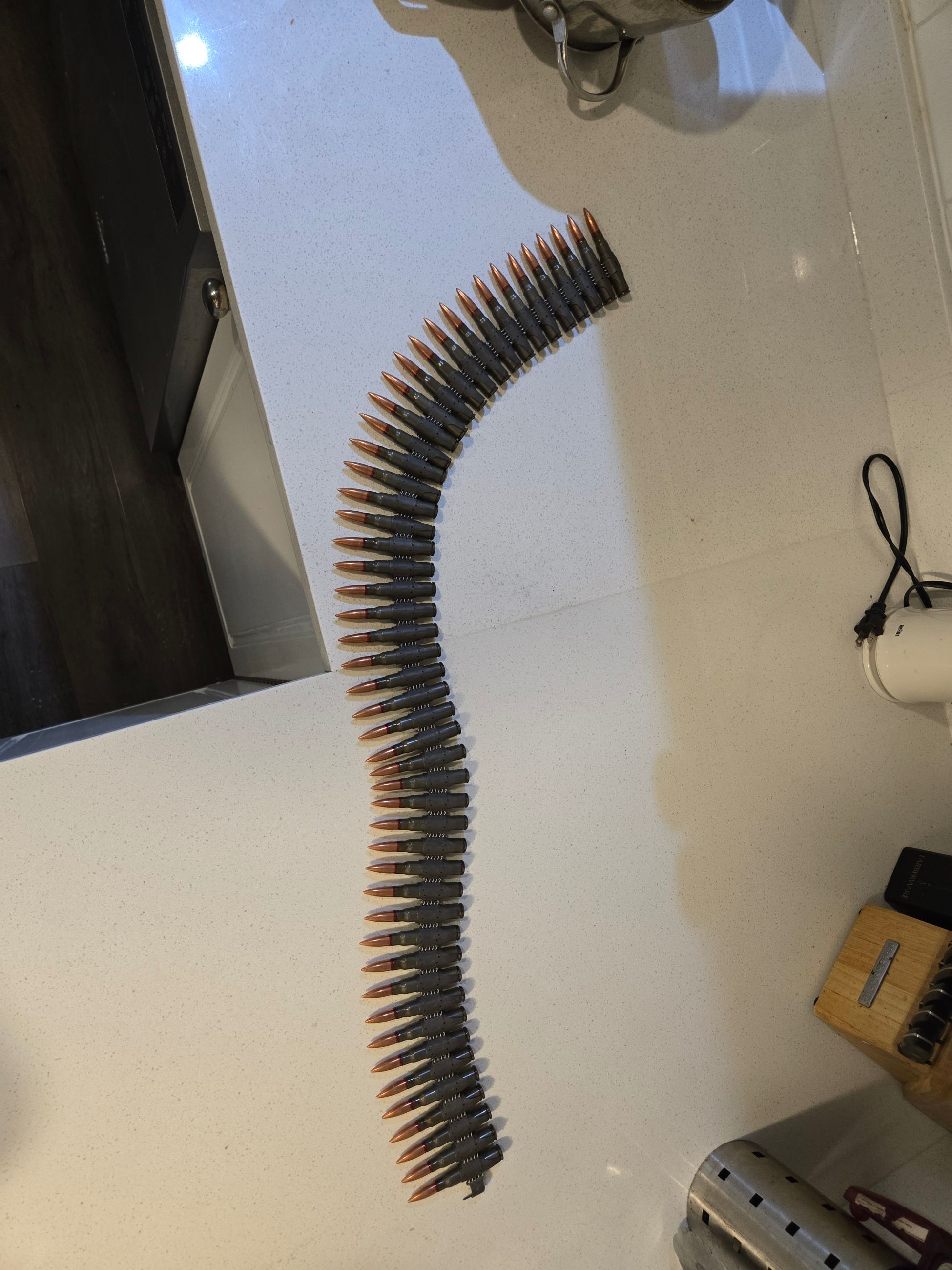 Photo of Linked 8mm mauser ammo