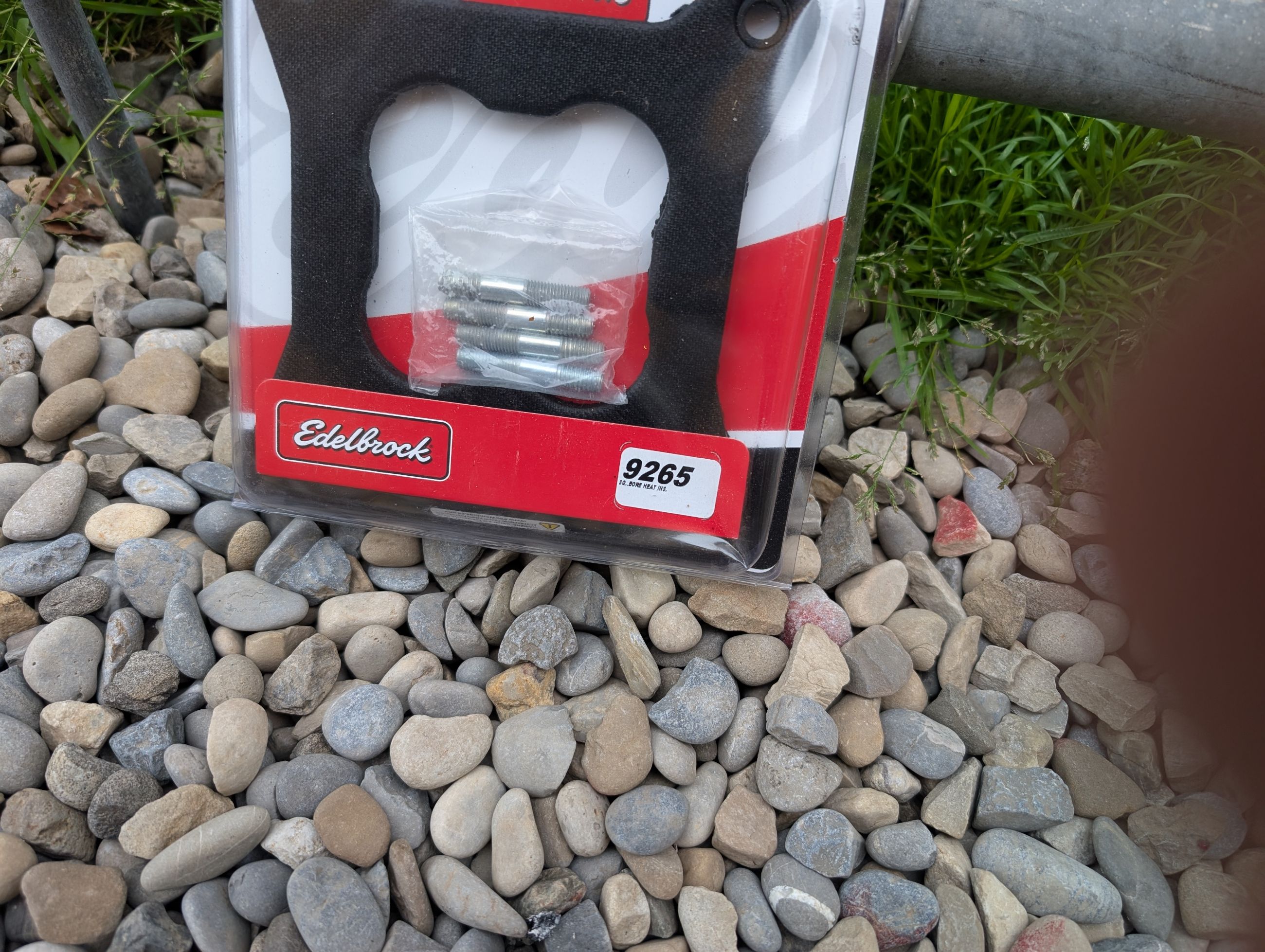 Photo of Edelbrock square bore 4 barrel carburetor insulator brand new 