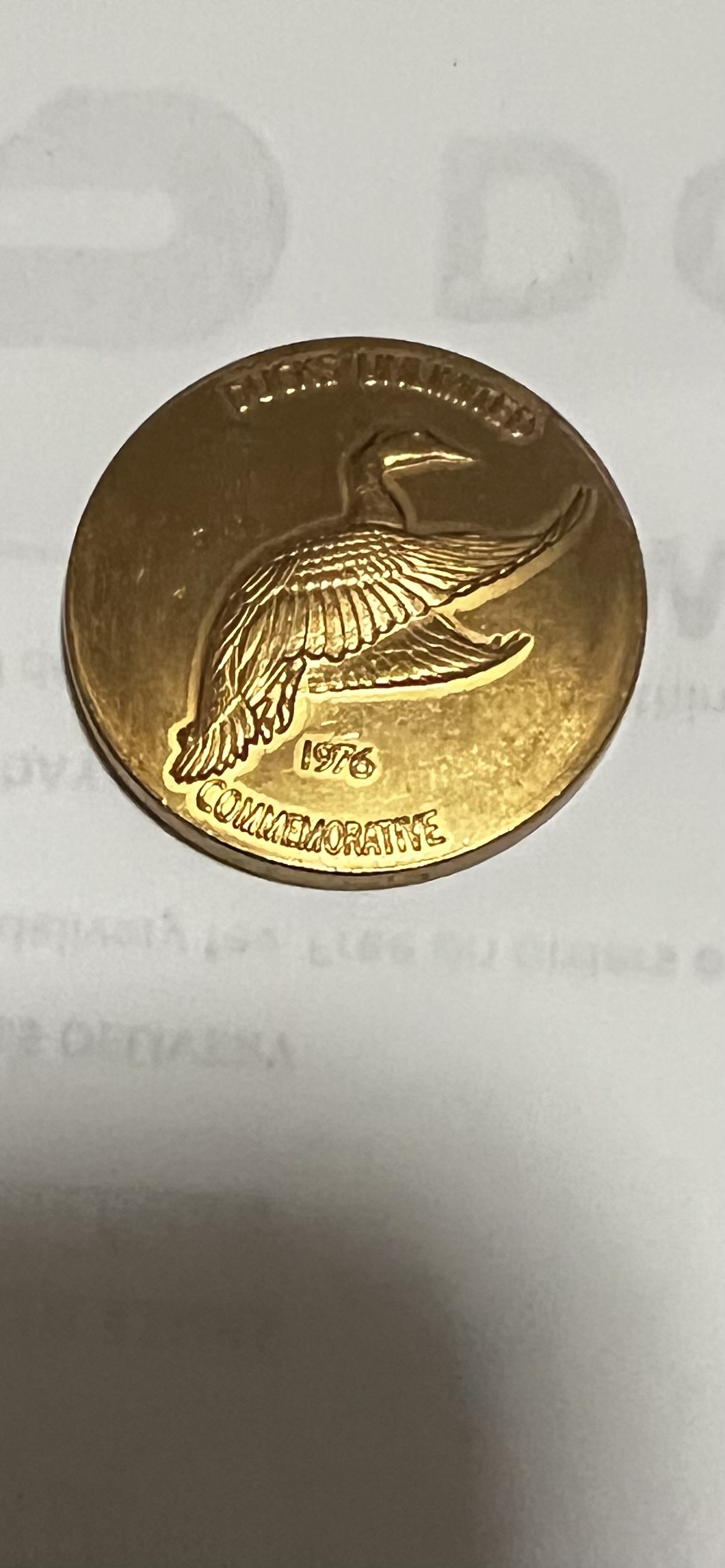 Photo of Winchester Ducks Unlimited model 1 oh one grip cap and medallion