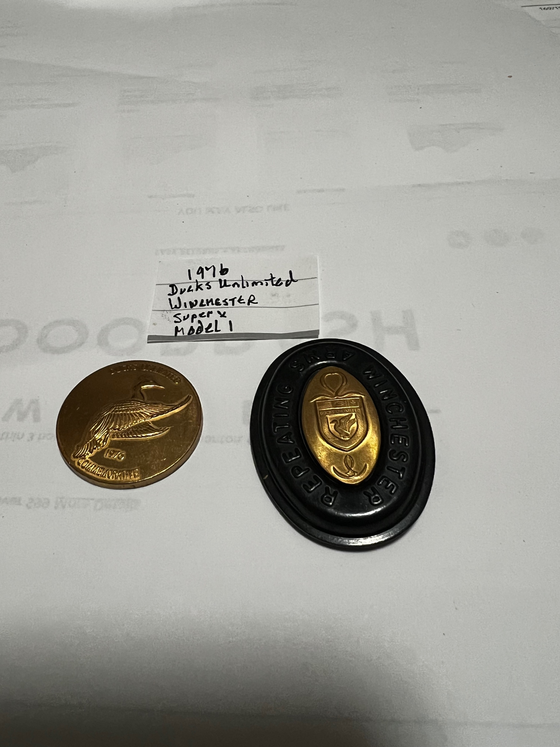 Photo of Winchester Ducks Unlimited model 1 oh one grip cap and medallion