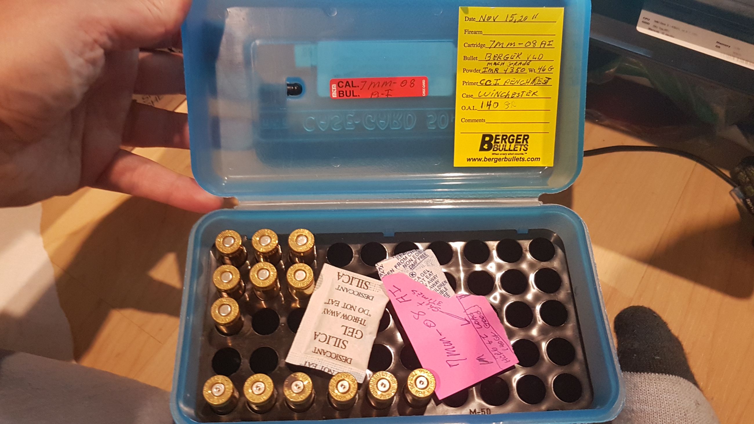 Photo of Blue MTM case-gard 50H case with (qty:7) Winchester 7mm08 REM reloaded cartridges and (qty:6) shot once brass casings ( mellonRSCA)