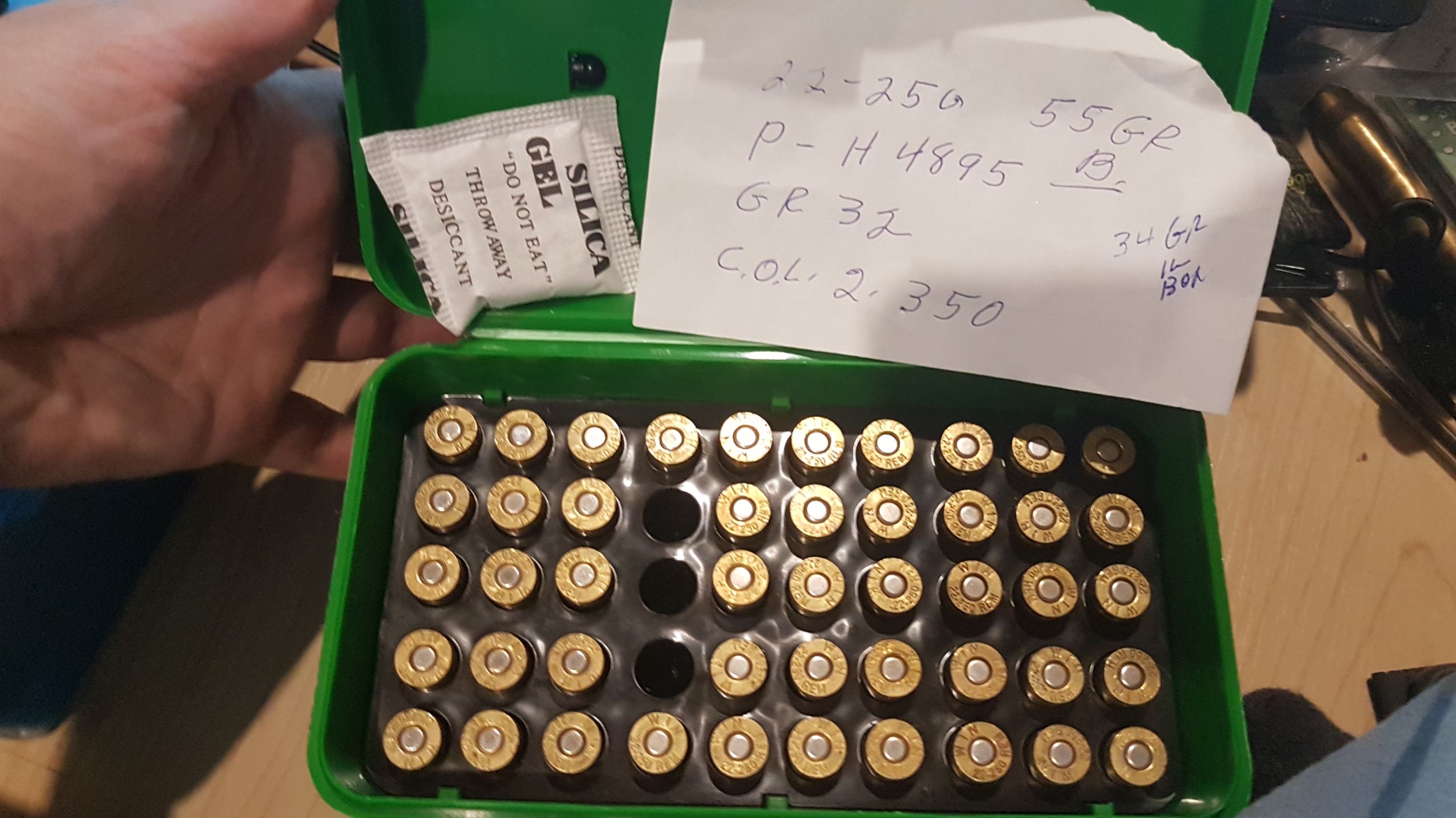 Photo of Green MTM case-gard 50-H case with (qty:47) reloaded Winchester .22-250 REM cartridges ( mellonRSCA)