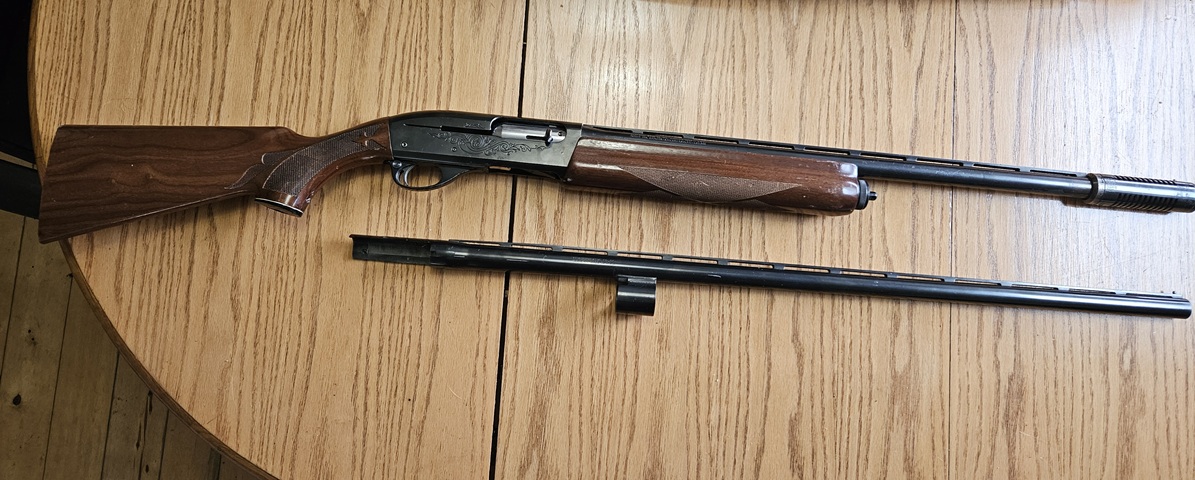 Photo of REMINGTON, MODEL 1100, 2 BARRELS, IN EXCELLENT CONDTION. REDUCED T0 $900, SHIPPING INCLUDED