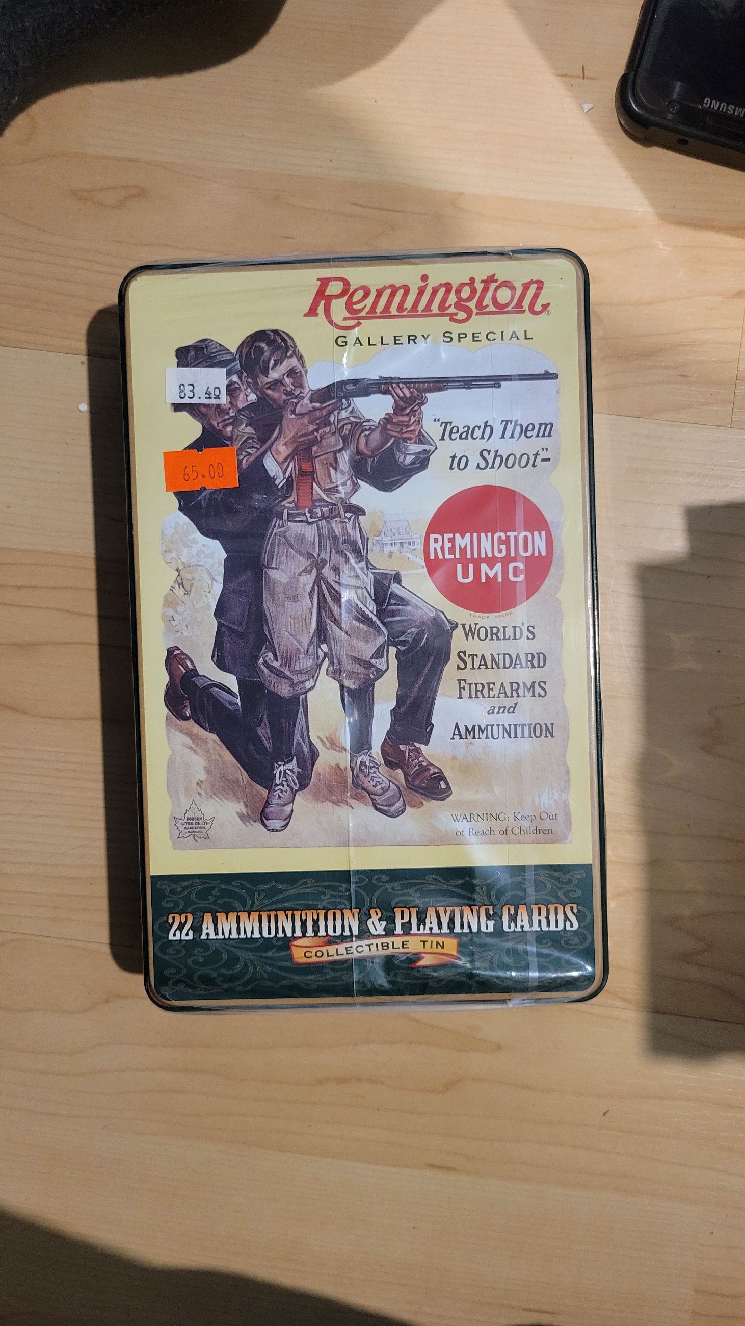 Photo of Remington Gallery Special "teach them to shoot" collector playing cards sealed in original package. ( mellonRSCA)