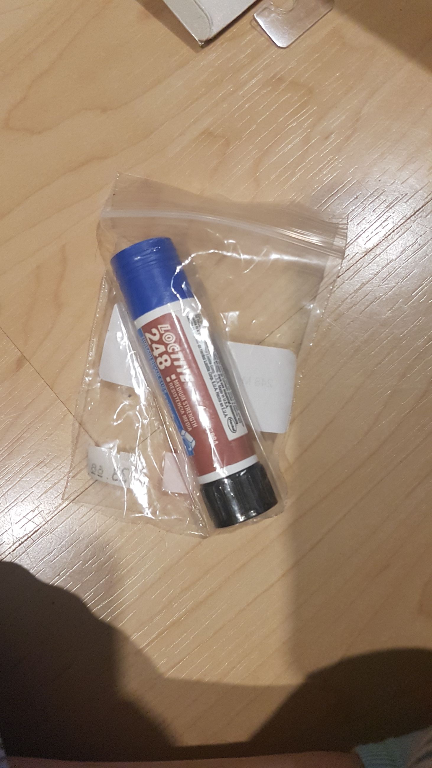 Photo of Loctite 248 medium strength thread locker stick ( mellonRSCA)