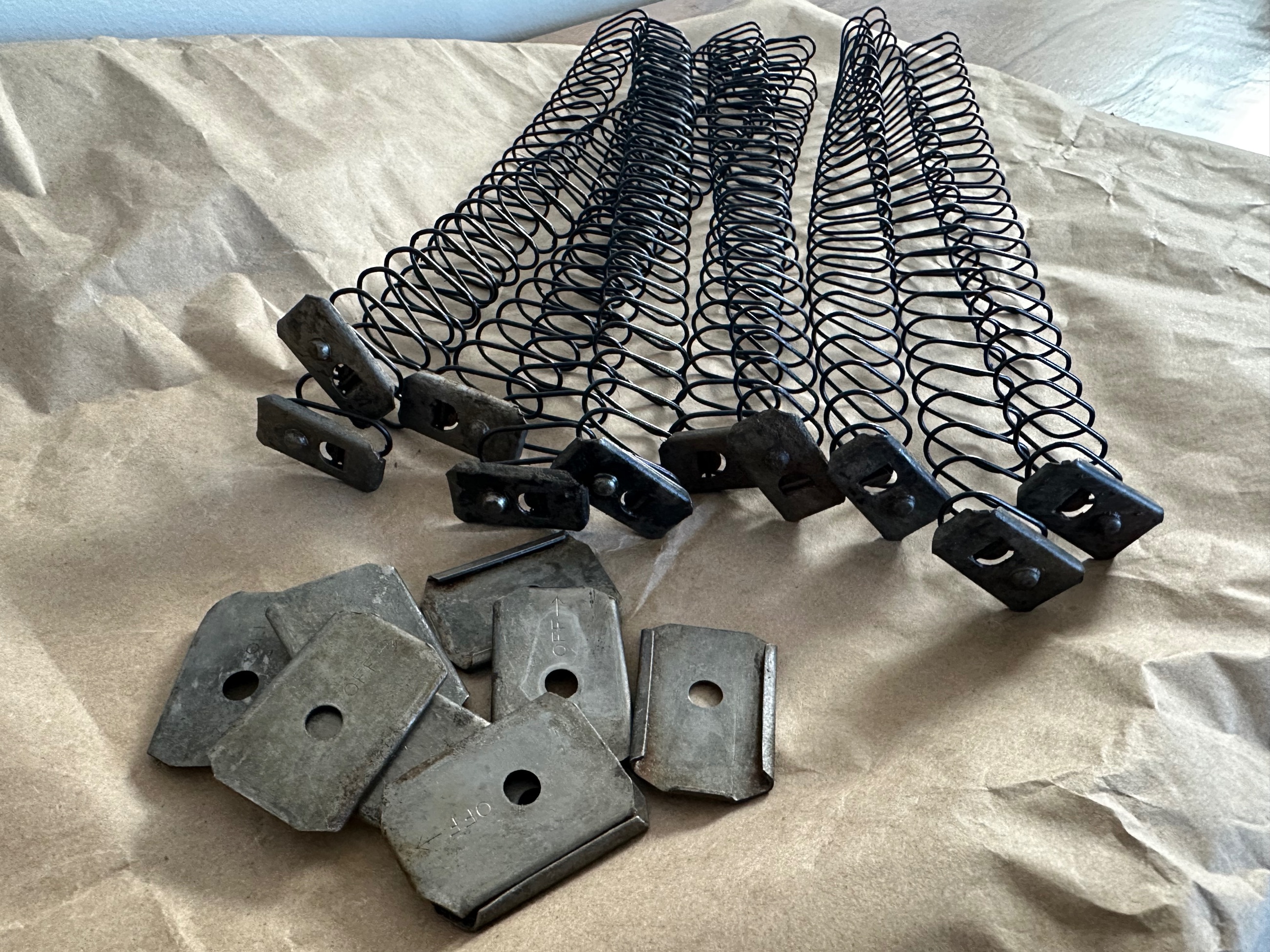 Photo of WW2 Sten mag springs and plates