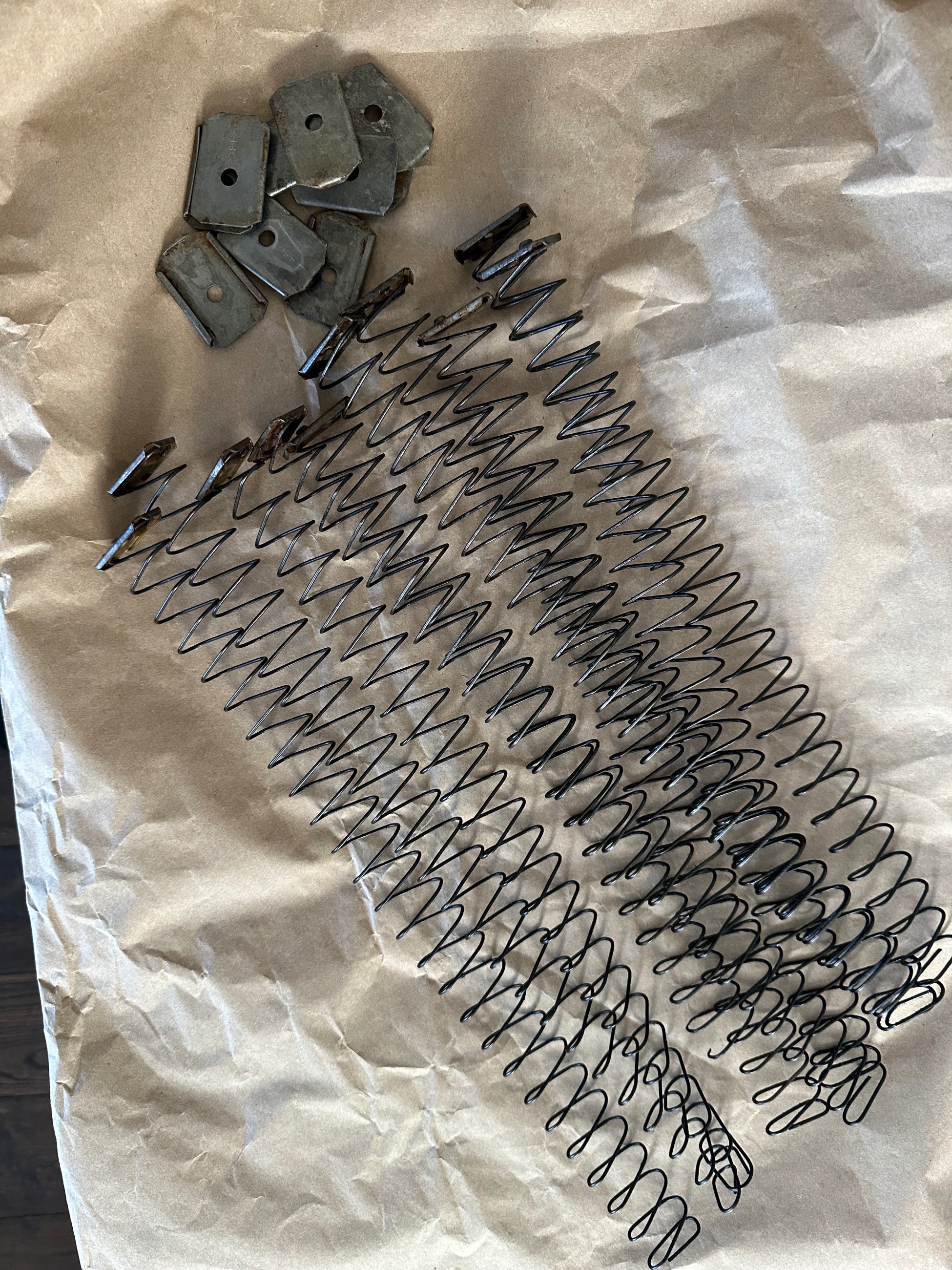 Photo of WW2 Sten mag springs and plates