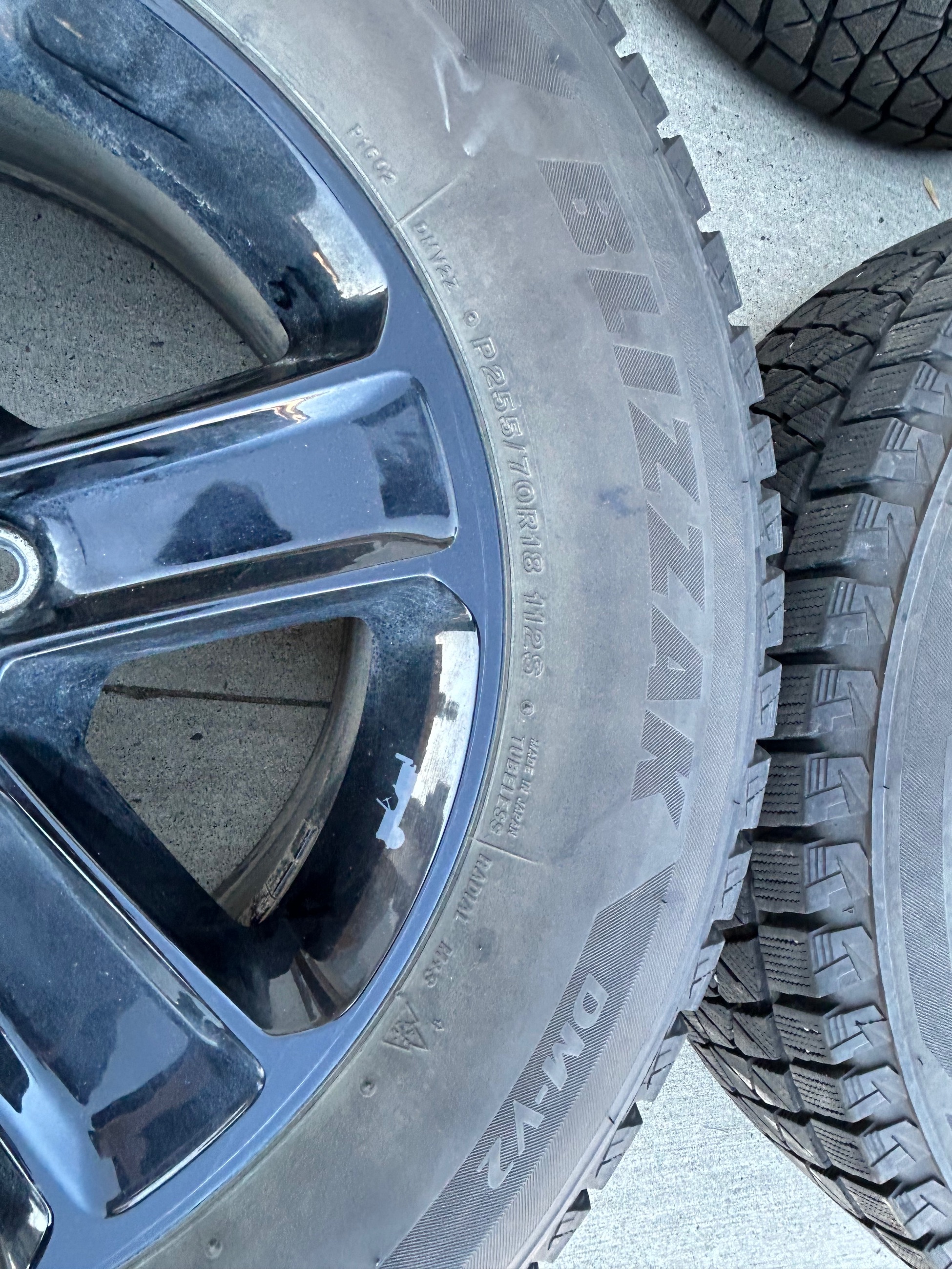 Photo of Bridgestone Blizzak Snow tires on Jeep OEM rims & Tires (255/70R18) w/ tpms