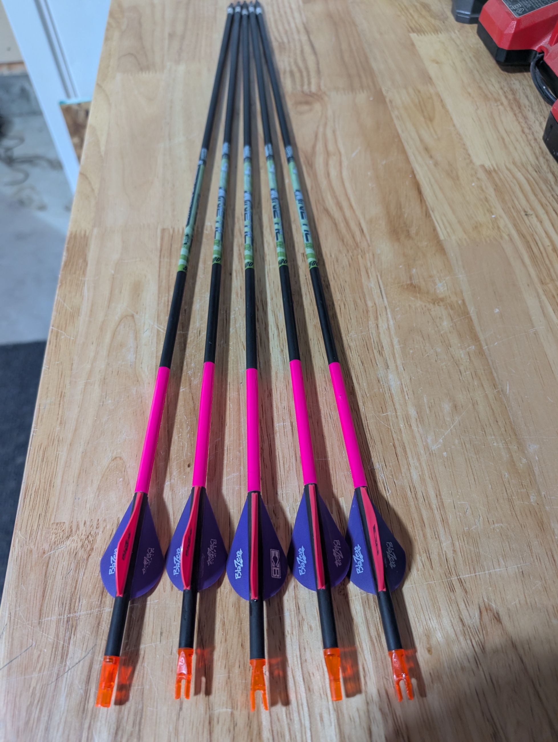 Photo of Women's Gold Tip Bow Arrows 
