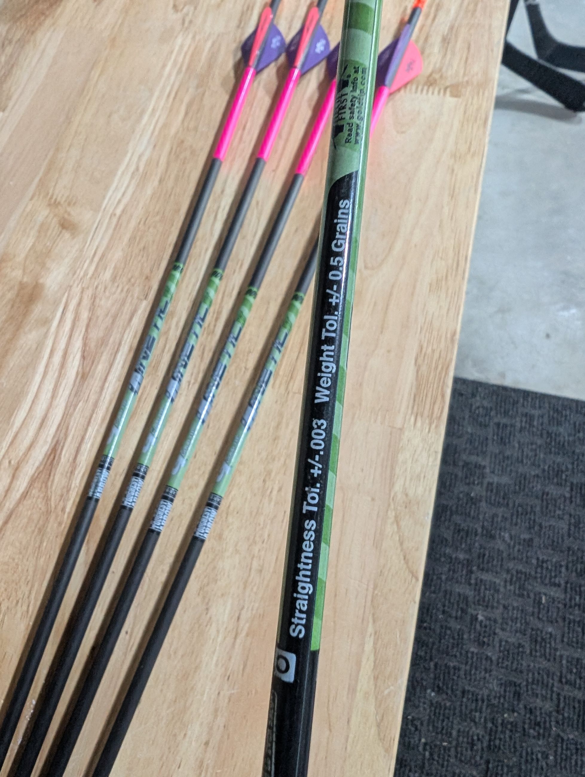 Photo of Women's Gold Tip Bow Arrows 