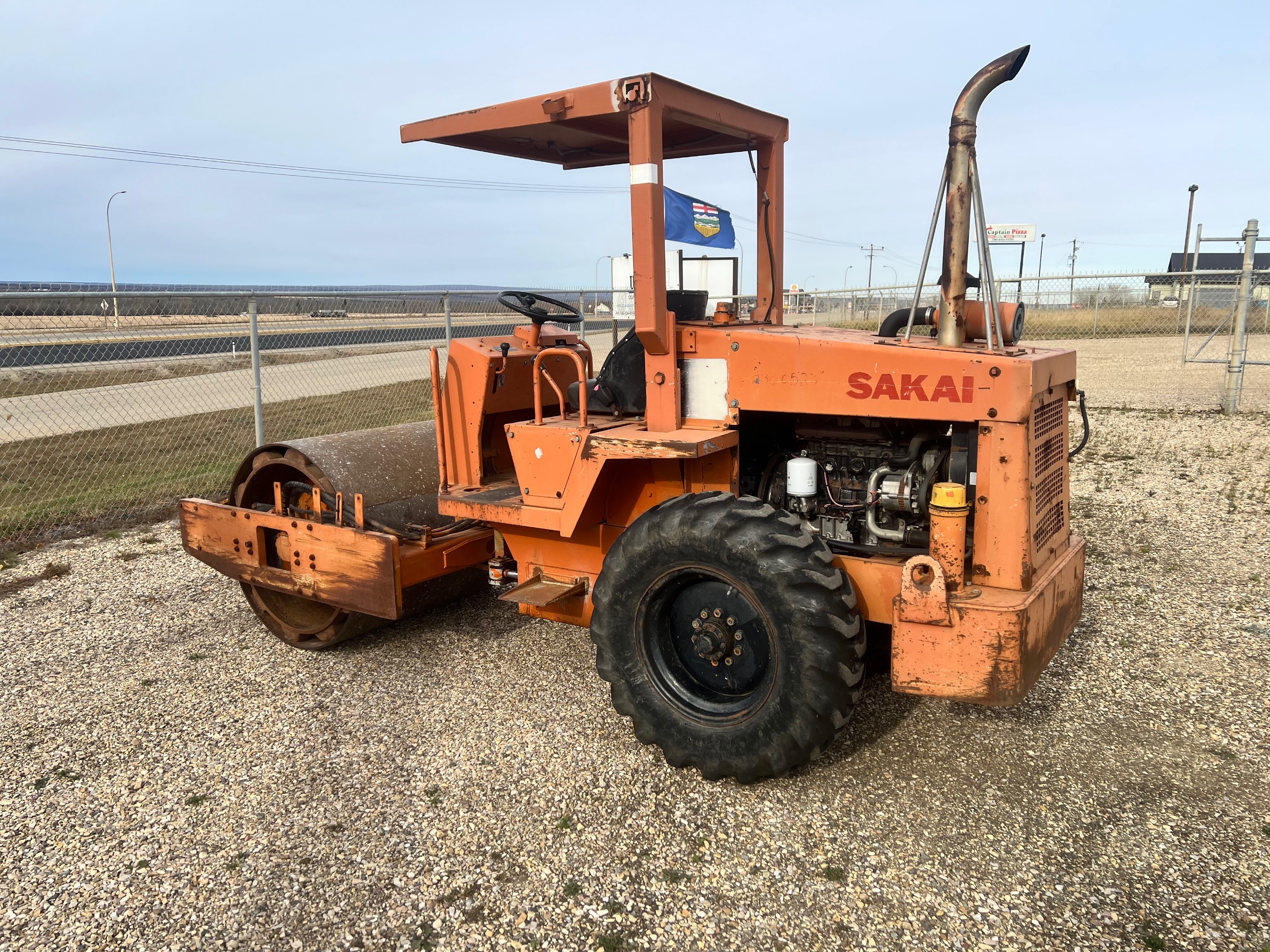 Photo of Sakai Vibratory pad foot packer with shell for sale