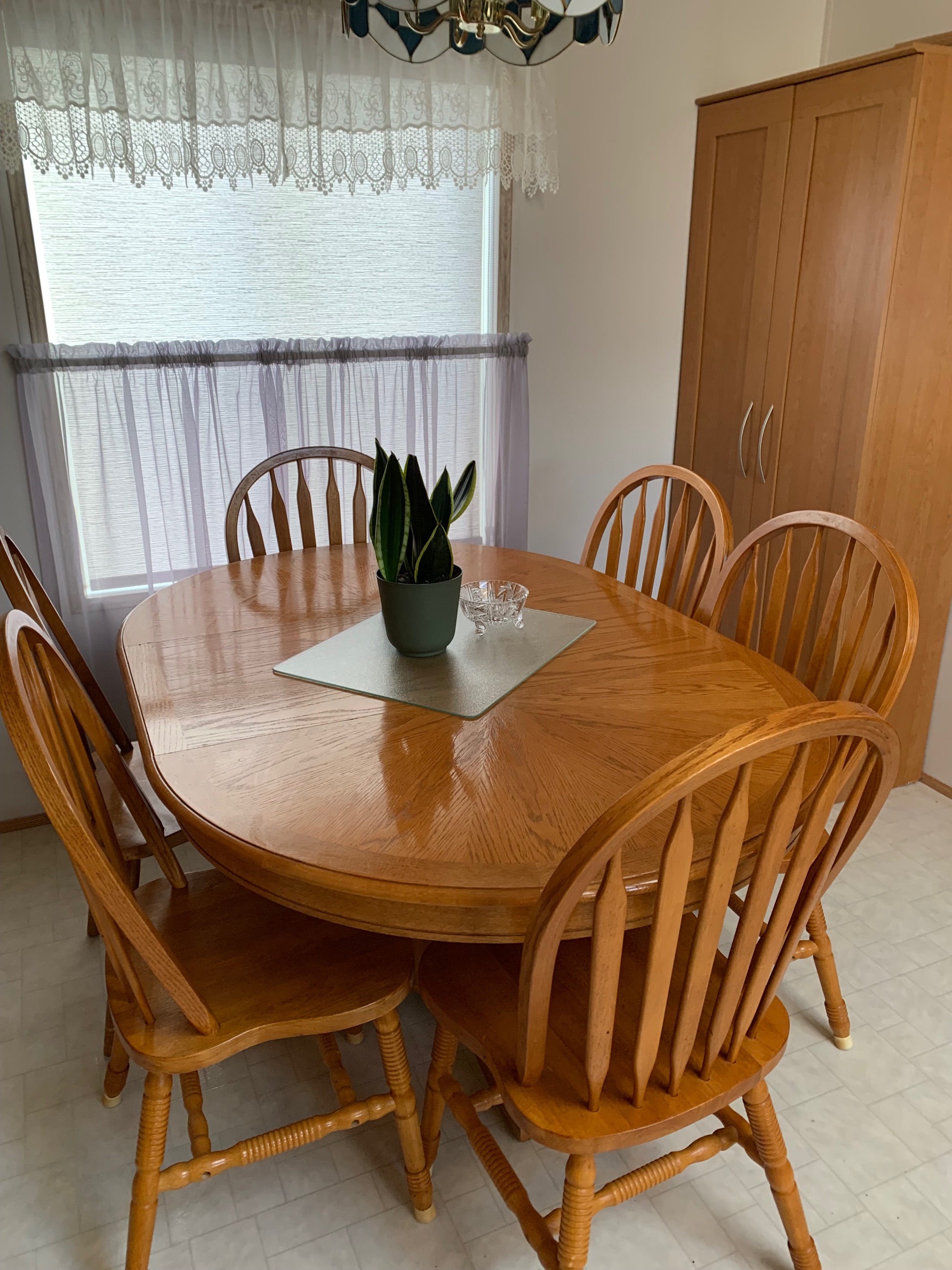 Photo of Oak dining table with 8 chairs